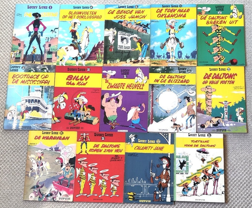 14 stripboeken van Lucky Luke Dupuis uitgaven, Meerdere stripboeken, Ophalen of Verzenden, Zo goed als nieuw
