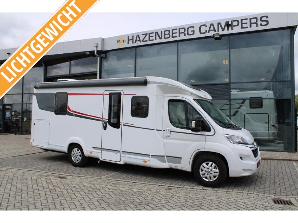 Van bekende zanger LMC T 720 Tourer 165 pk Queensbed (77, Kluisje, Tot en met 2, 7 tot 8 meter, Bedrijf