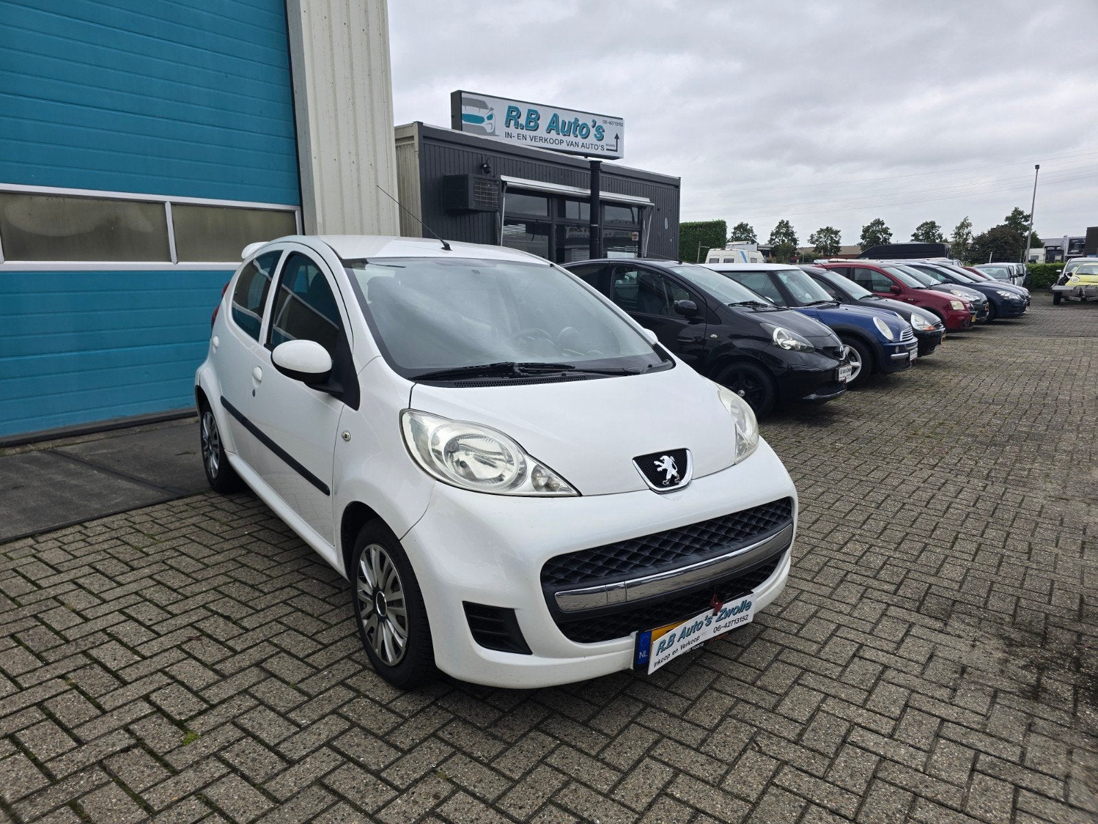 Peugeot 107 1.0 12V 5DR 2011 Wit, Voorwielaandrijving, Euro 5, Stof, Zwart