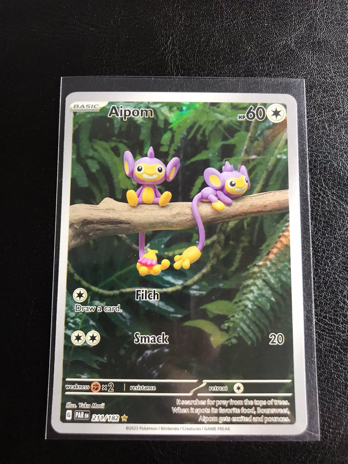 Aipom - Paradox Rift, Hobby en Vrije tijd, Verzamelkaartspellen | Pokémon, Ophalen of Verzenden, Zo goed als nieuw