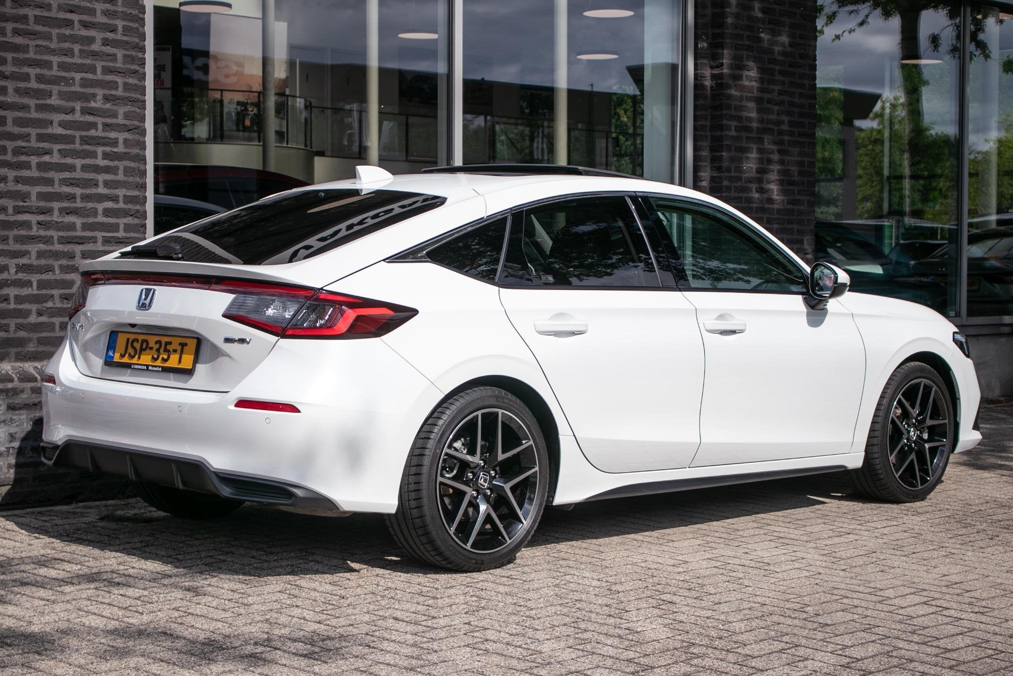Honda Civic 2.0 e:HEV Advance | Schuifdak | Navi | Leder, Auto's, Dealer onderhouden, Gebruikt, 4 cilinders, Wit