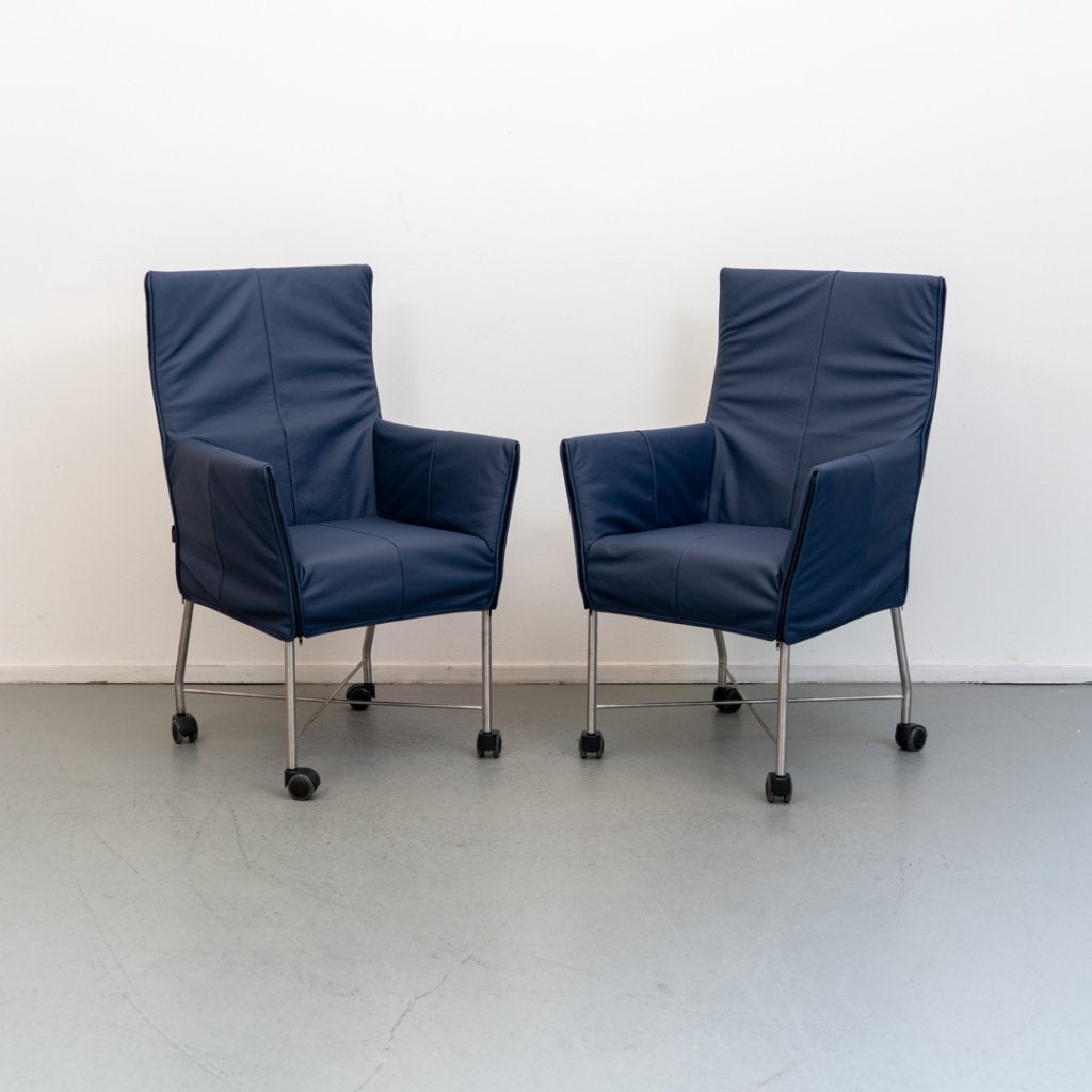 8 Montis Chaplin eetkamerstoelen kobaltblauw - verrijdbaar, Niet ingevuld, Niet ingevuld, Nieuw, Leer