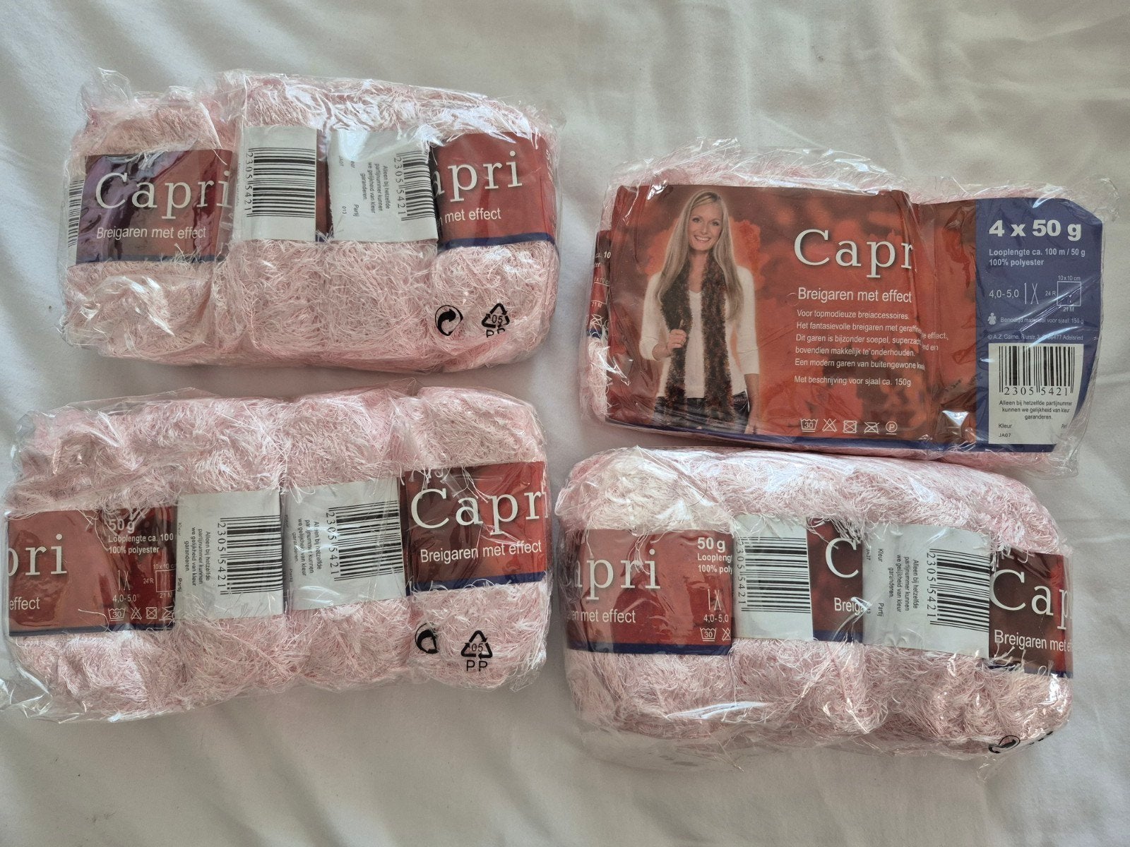 Capri brei garen met leuk effect. Blauw en rose., Hobby en Vrije tijd, Breien en Haken, Ophalen of Verzenden, Nieuw, Breien of Haken