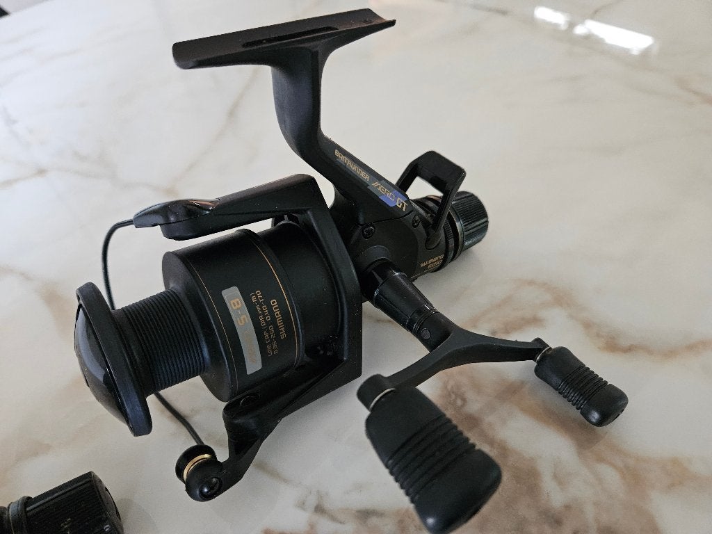 2x molen Shimano baitrunner Aero GT 6010, Watersport en Boten, Ophalen of Verzenden, Zo goed als nieuw, Molen