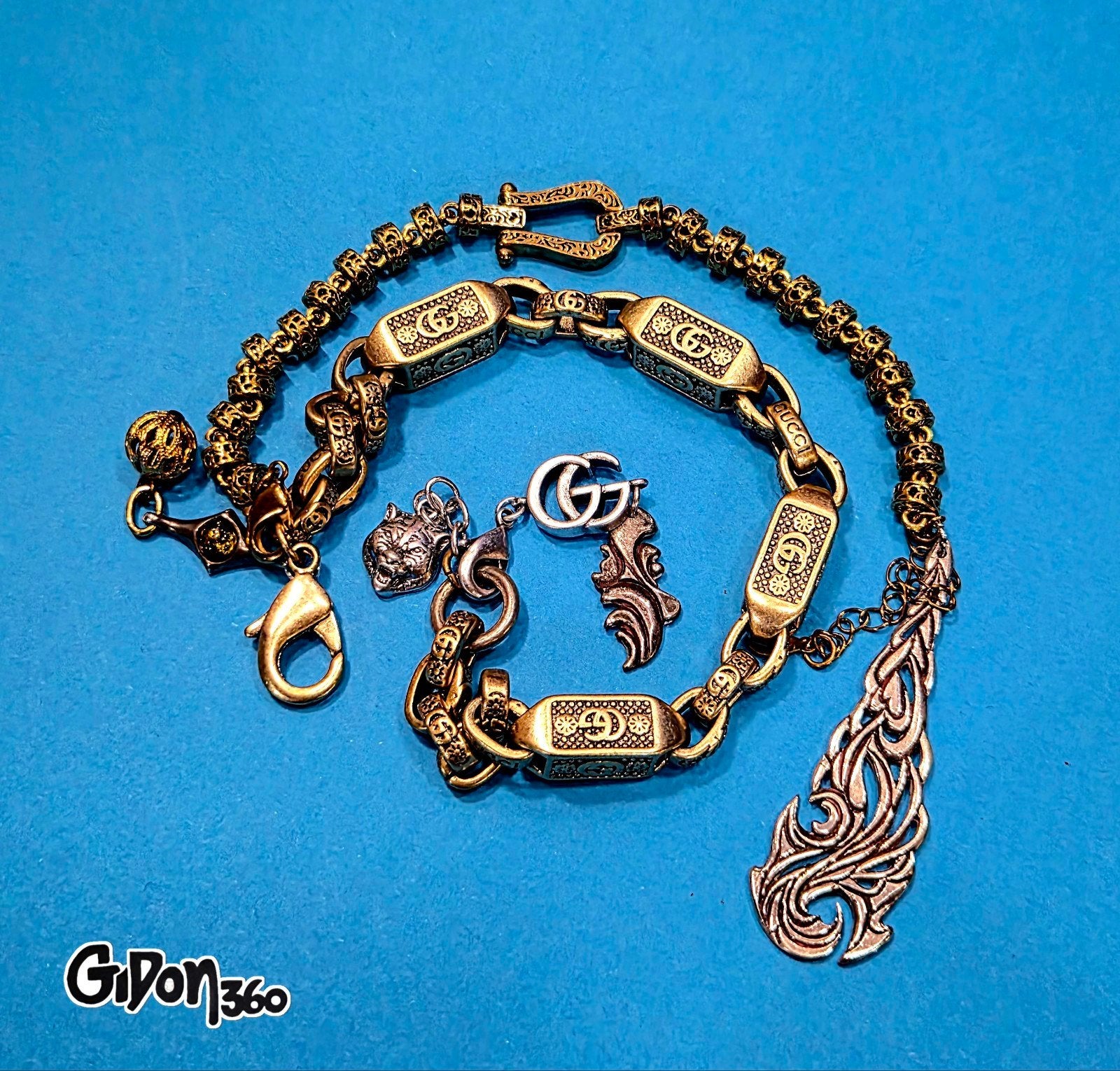 Gucci gold tone chain, sterling silver pendant/charms, Amber, Ophalen of Verzenden, Goud, Zilver