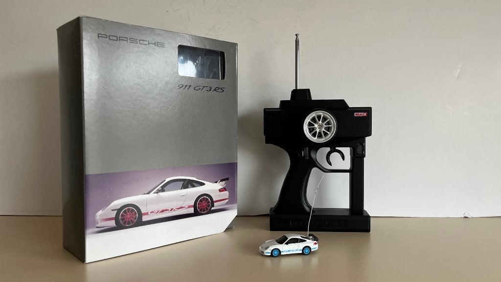 RC Porsche 911 GT3RS  1:64 mini RC auto + zender Exclusief, Elektro, Nieuw, Ophalen of Verzenden, Auto onroad