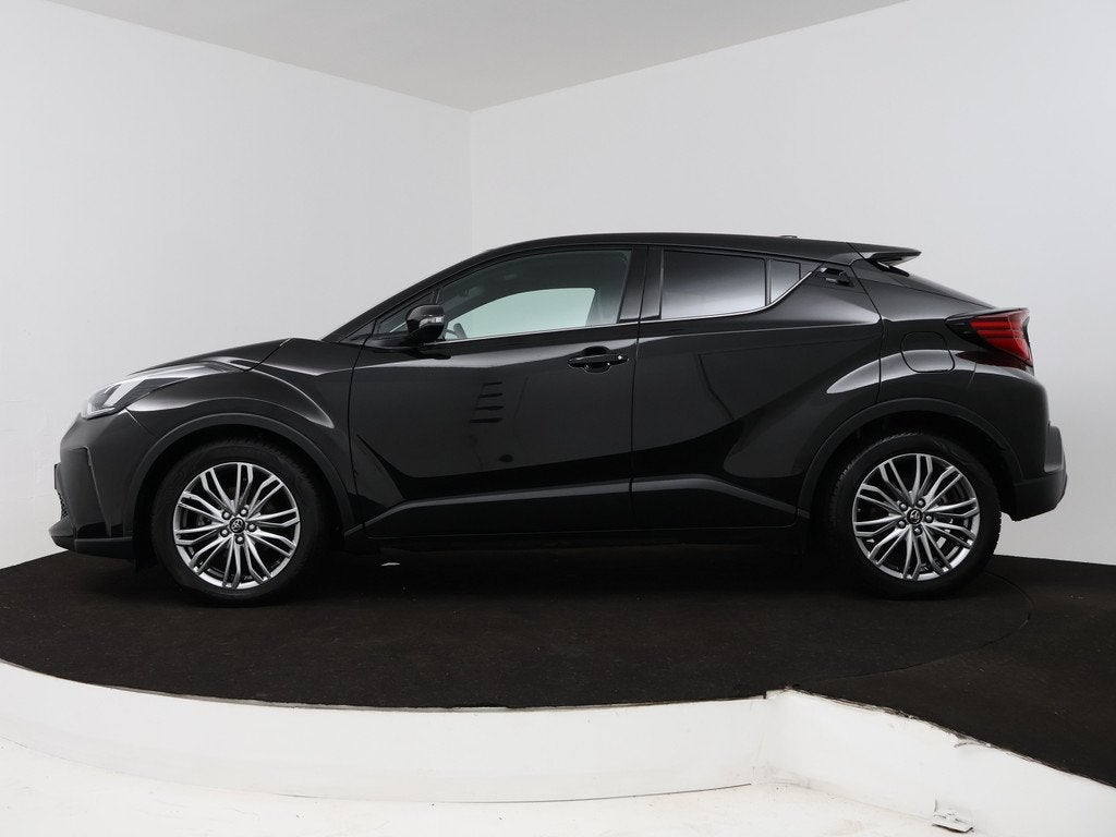 Toyota C-HR 2.0 Hybrid Executive | Navigatie | JBL | BLS |, 12 maanden, 4 cilinders, Leder en Stof, Zwart