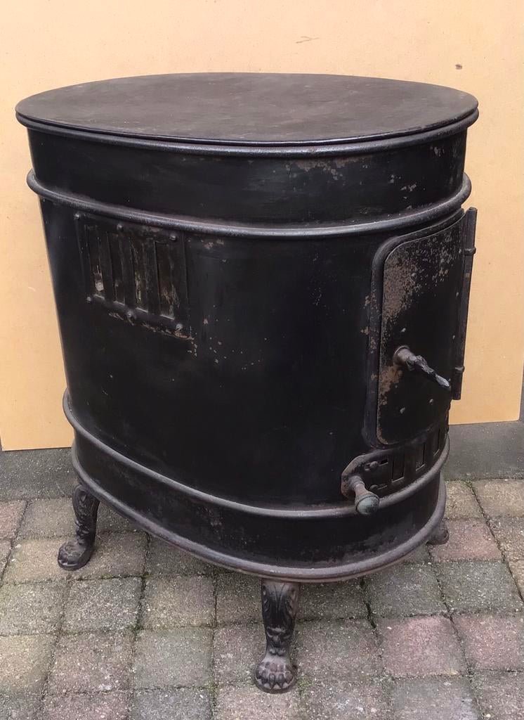 Antieke ovale gietijzeren kachel, kolenkachel, Huis en Inrichting, Kachels, Gebruikt, Kolenkachel, Overige brandstoffen, Ophalen