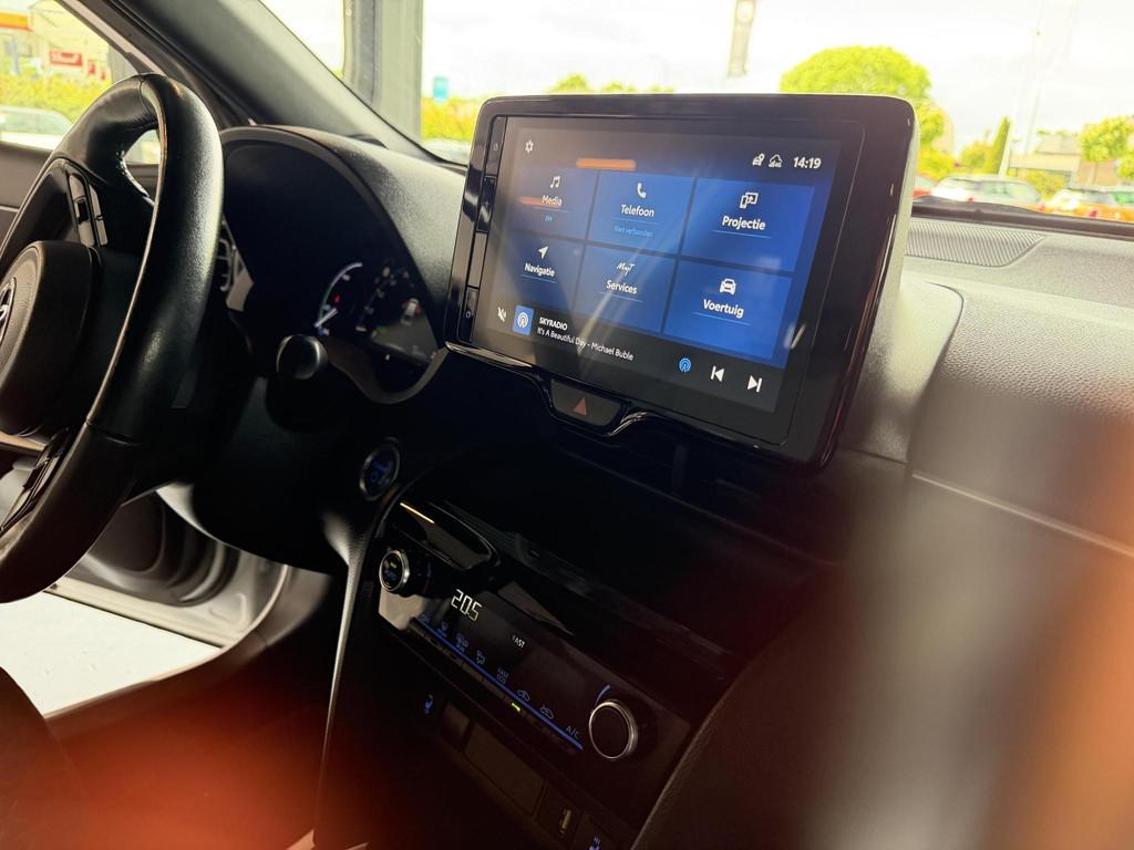 Toyota Yaris Cross 1.5 Hybrid Explore AUTOMAAT| CAMERA| NAVI, Stof, Gebruikt, 116 pk, Wit
