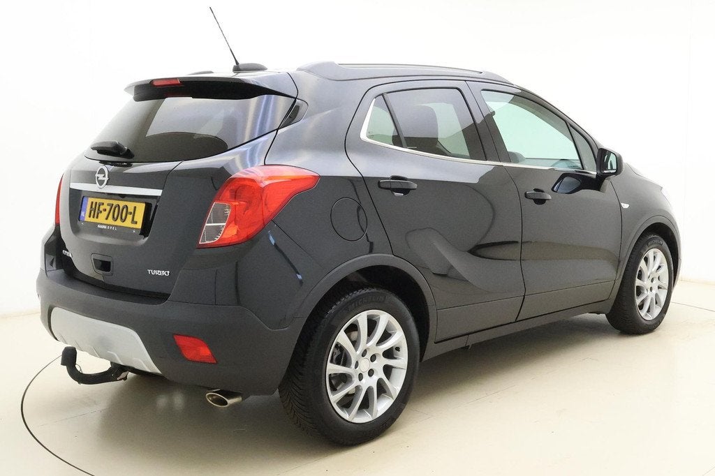 Opel Mokka 1.4 T Cosmo 140 PK | Trekhaak | Navigatie | AGR C, Auto's, Opel, Voorwielaandrijving, Gebruikt, 4 cilinders, Zwart