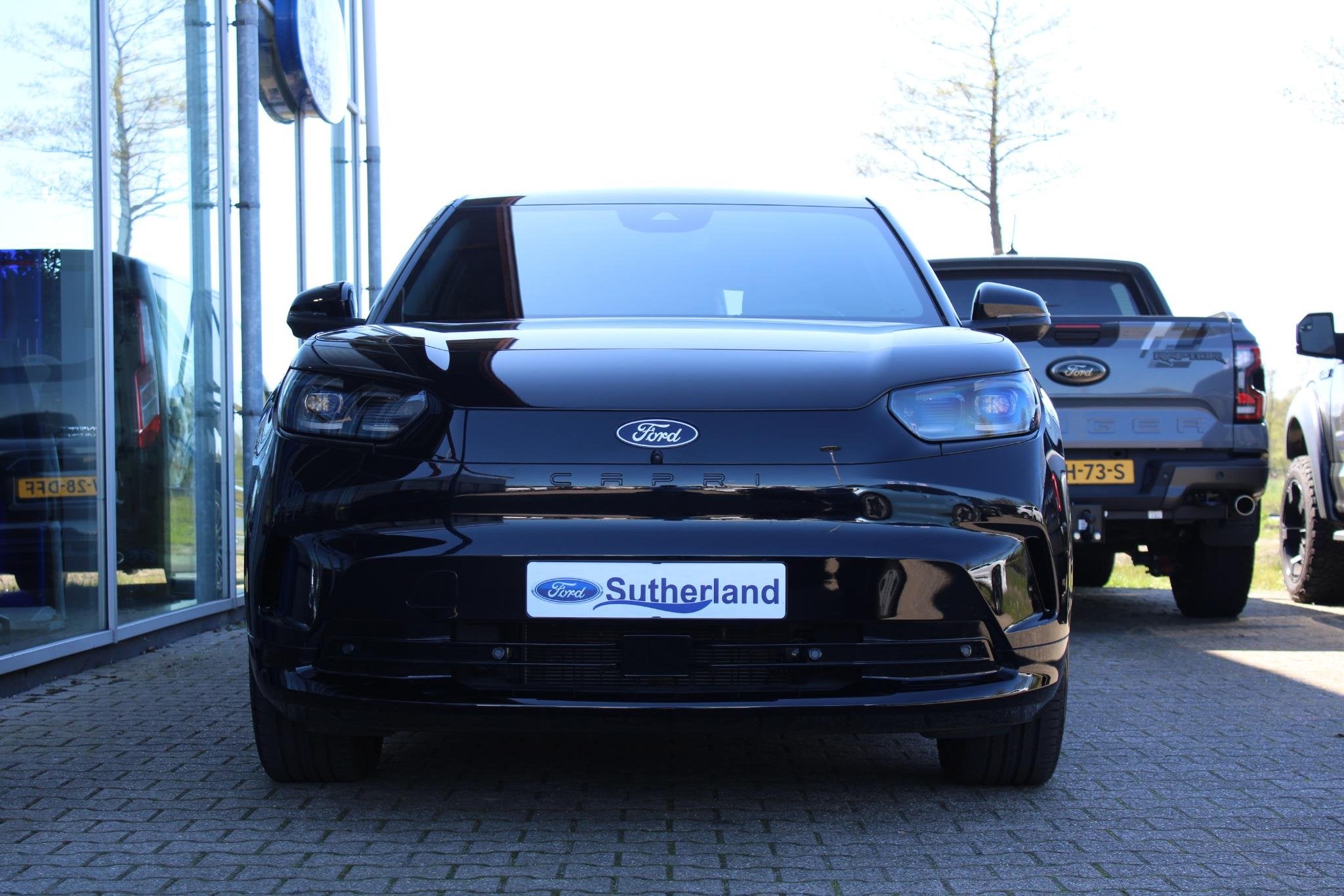 Ford Capri Extended Range AWD 79 kWh 340pk | AGR stoelen | W, Auto's, Automaat, Dealer onderhouden, Gebruikt, Leder en Stof