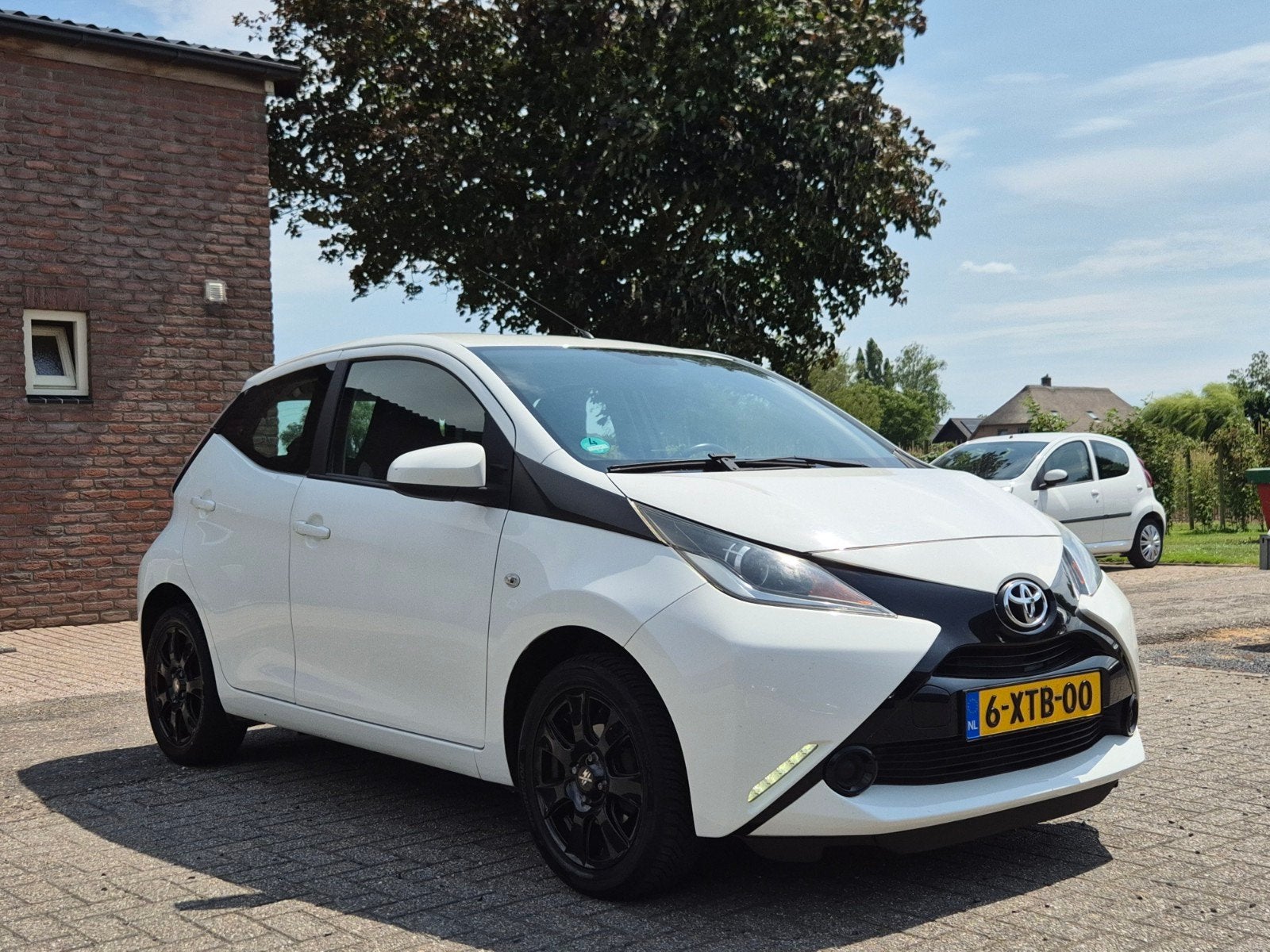 Toyota Aygo 1.0 12V Vvt-i Ddrs 2015 Wit I Airco I Camera I C, Auto's, Toyota, Voorwielaandrijving, Stof, Euro 6, Met garantie (alle)