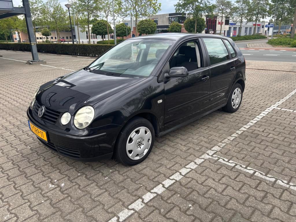 Volkswagen Polo 1.4 55KW Automaat Airco Trekhaak cruise, Auto's, Automaat, Stof, 74 pk, Zwart