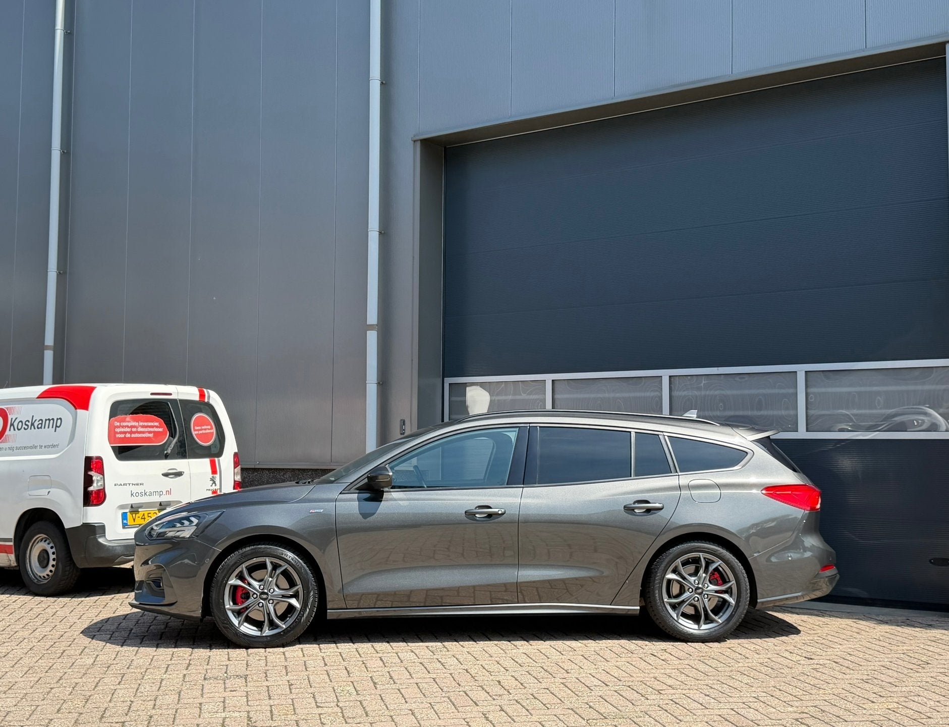 Ford Focus Wagon 1.0 Vignale ST-Line bj.2019 Camera|Navi|Pdc, Gebruikt, Euro 6, 1283 kg, Grijs