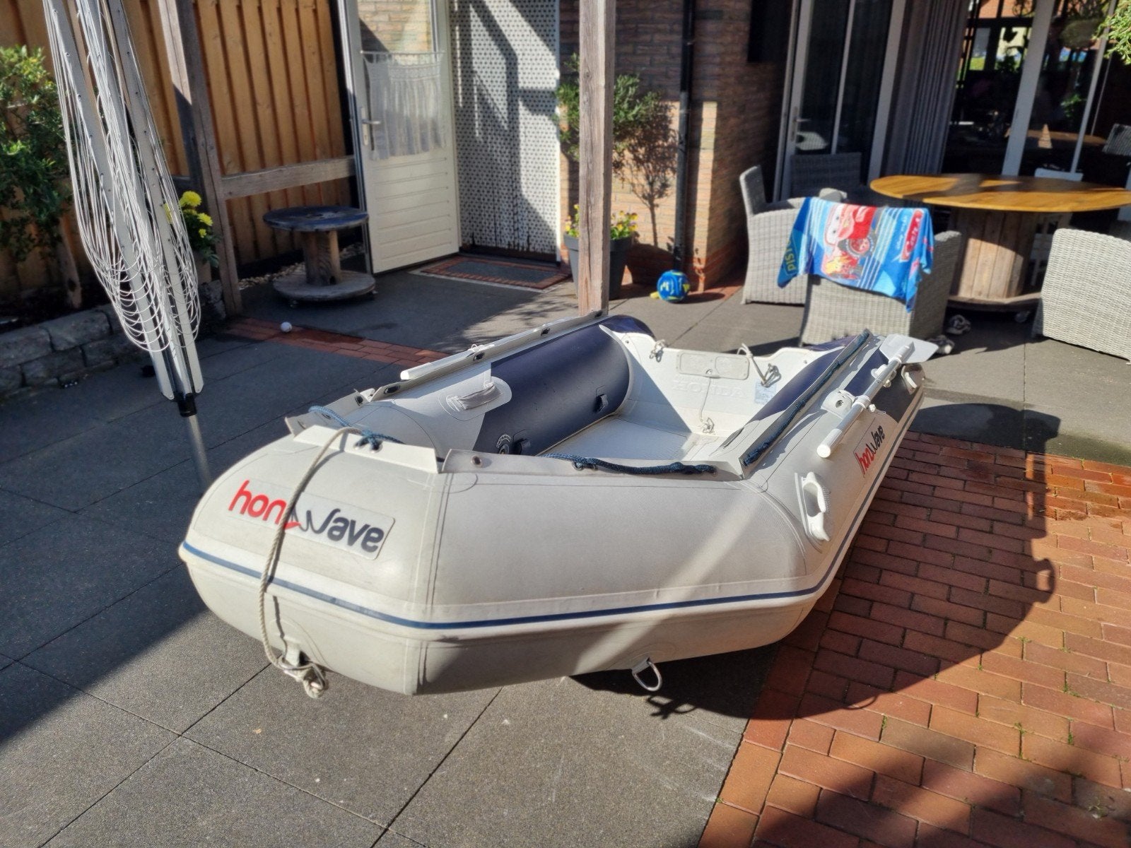 Honwave opblaasboot met Sail 4pk buitenboordmotor, Watersport en Boten, Rubberboten, Gebruikt, PVC, Inclusief motor, Ophalen