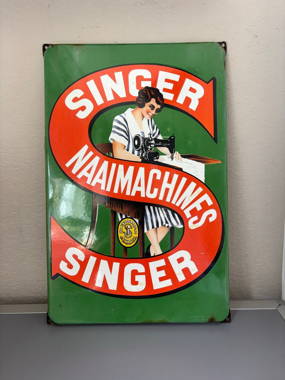 Emaille Reclamebord Singer Naaimachines Langcat Bussum, Ophalen of Verzenden, Gebruikt, Reclamebord