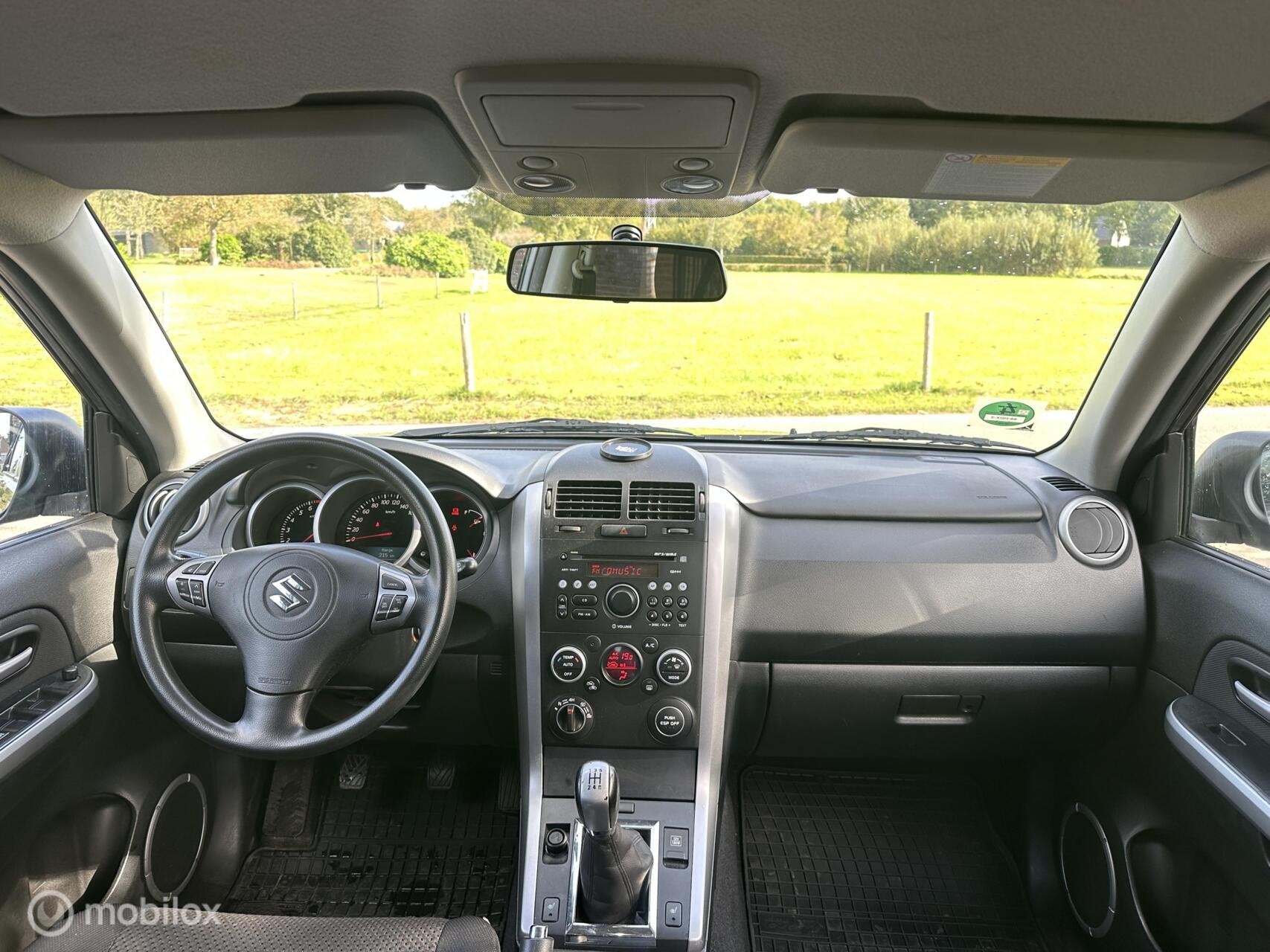 Suzuki Grand Vitara 2.4 Exclusive 4x4 Trekhaak Cruise✅, Stof, Gebruikt, Zwart, 4 cilinders