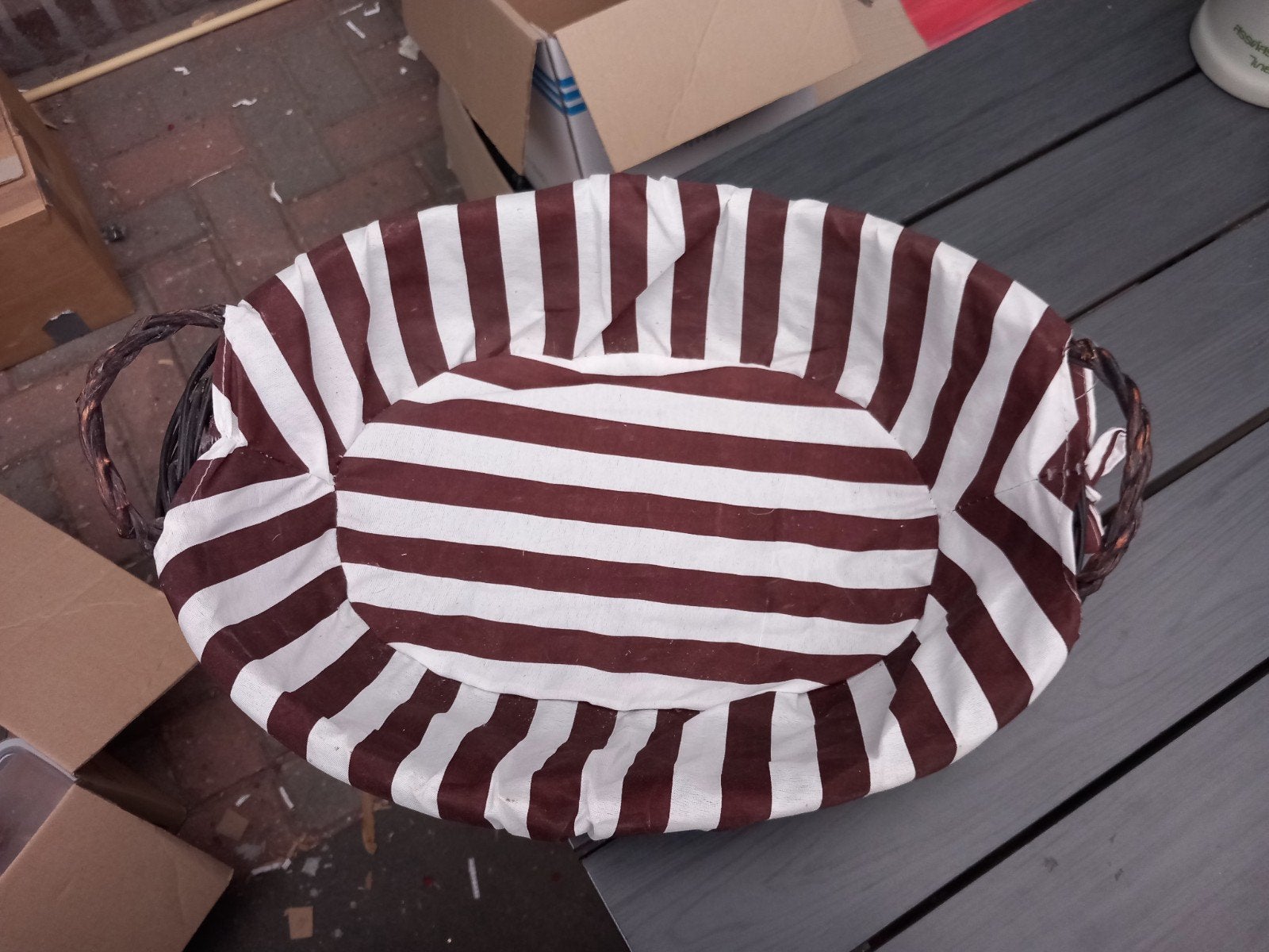 Ovale rieten mand met gestreepte stoffen voering, Huis en Inrichting, Woonaccessoires | Schalen en Manden, Mand, Ophalen of Verzenden