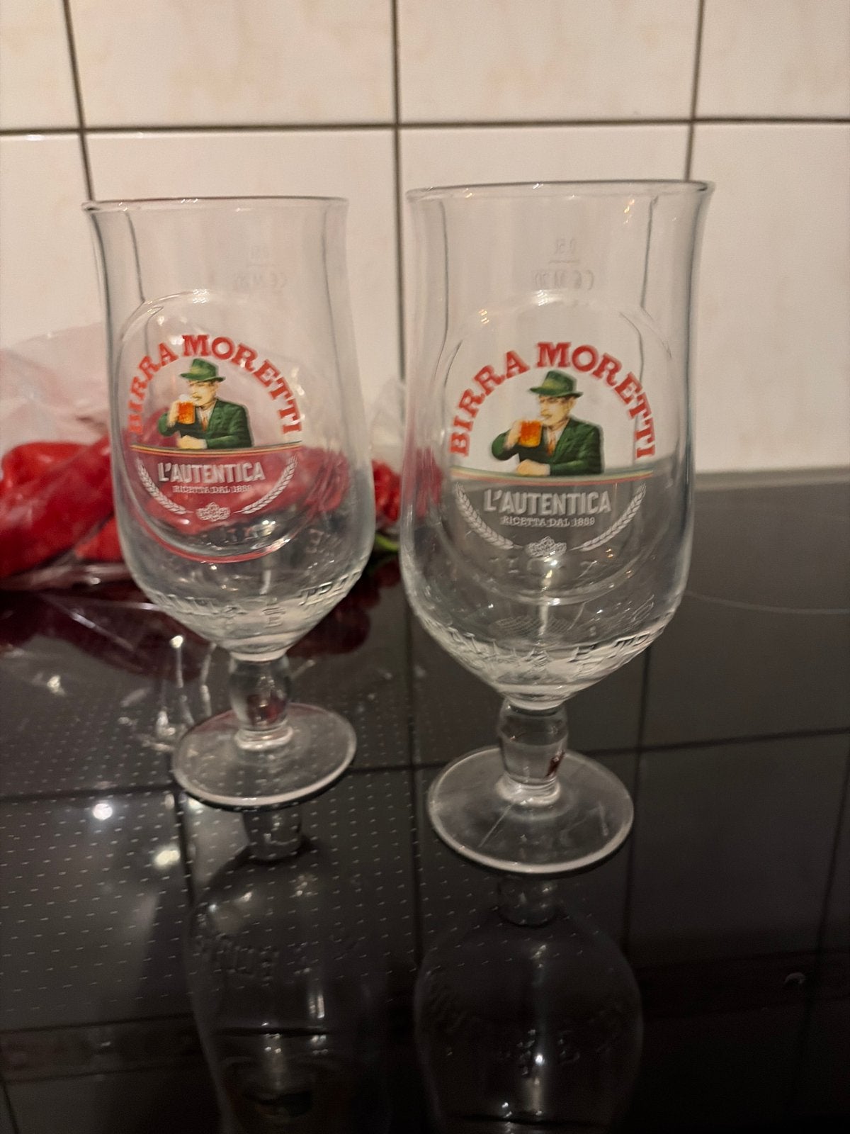 2 Birra Moretti halve liter glazen (1 koop), Ophalen of Verzenden, Zo goed als nieuw, Glas of Glazen, Overige merken
