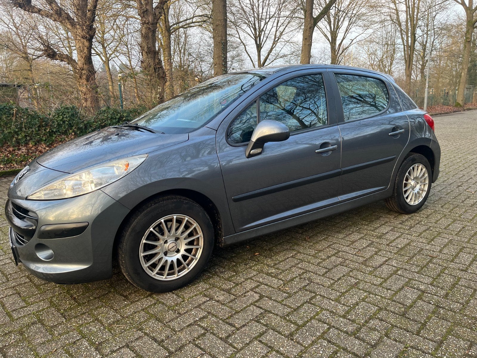Peugeot 207 1.4 VTI 16V 5DRS 2009 Grijs, Auto's, Voorwielaandrijving, 1153 kg, Origineel Nederlands, Handgeschakeld