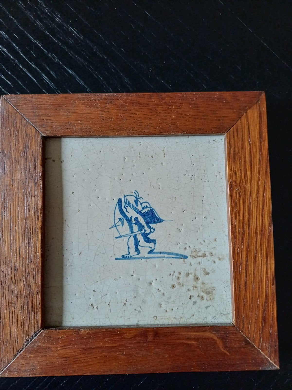 Ingelijste Delfts blauwe tegel met Cupido, Ophalen of Verzenden