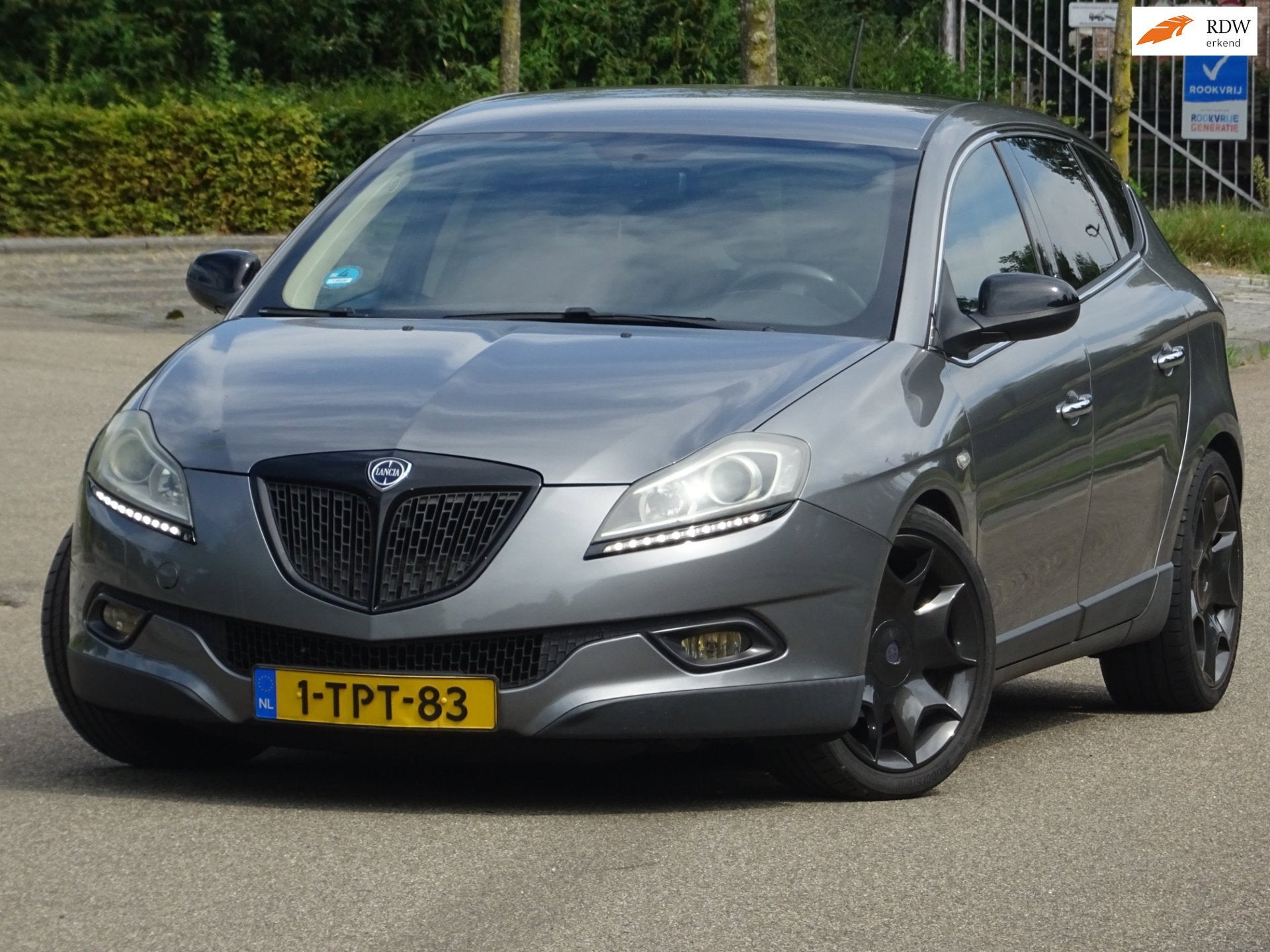 Lancia Delta 1.4-16V Oro BJ2011 LEER/CARPLAY/CLIMA/PDC/APK, Auto's, Lancia, Voorwielaandrijving, Dealer onderhouden, Parkeersensor