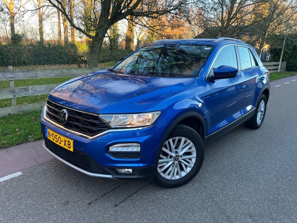Volkswagen T-Roc 1.0 TSI Style Business Navi Camera Trekhaak, Auto's, Volkswagen, Voorwielaandrijving, Stof, Gebruikt, Blauw