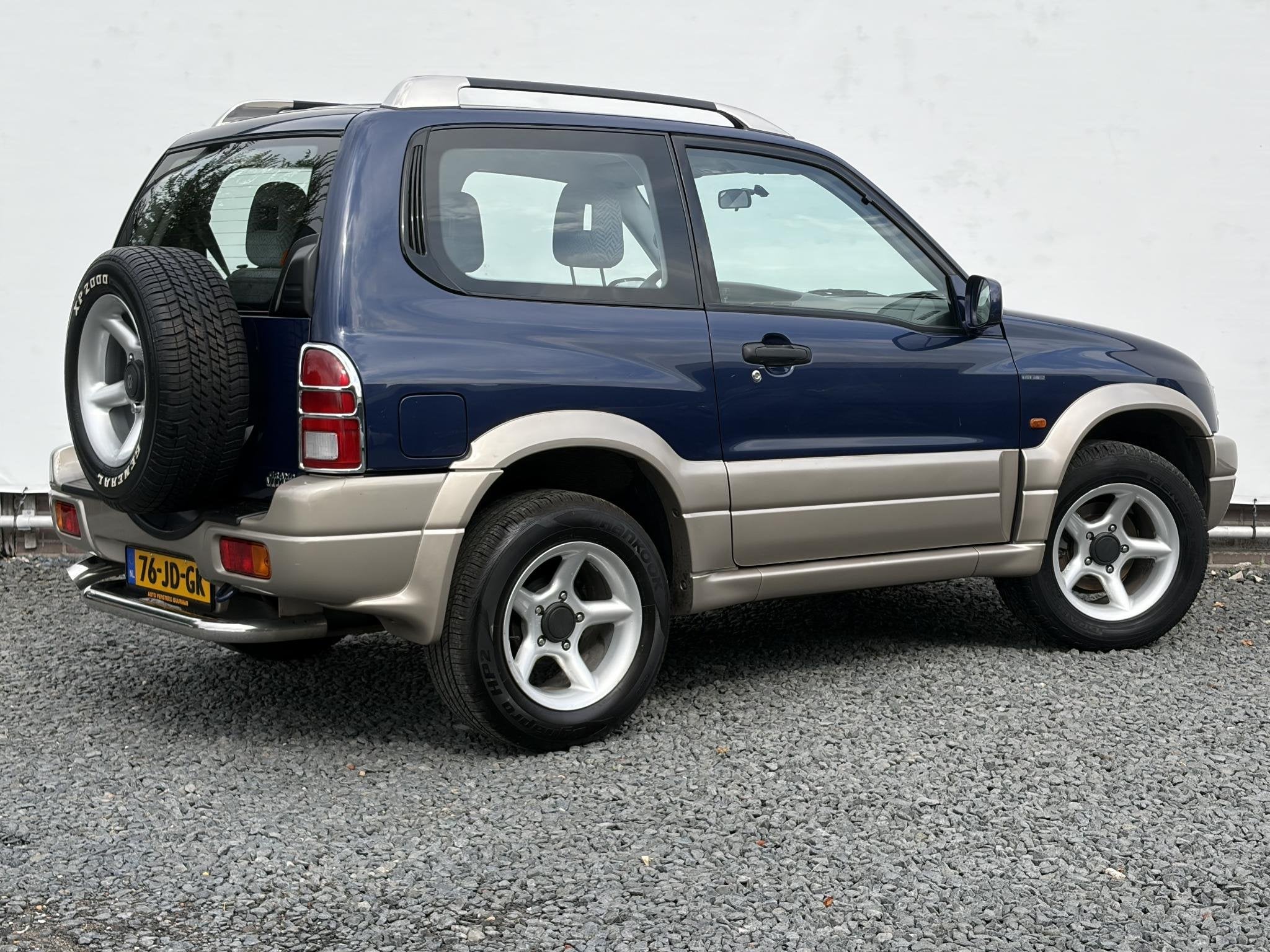 Suzuki Grand Vitara 2.0 Metal Top Wide Body 1e Eig Dealer on, Auto's, Zwart, 4 cilinders, Bedrijf, Handgeschakeld