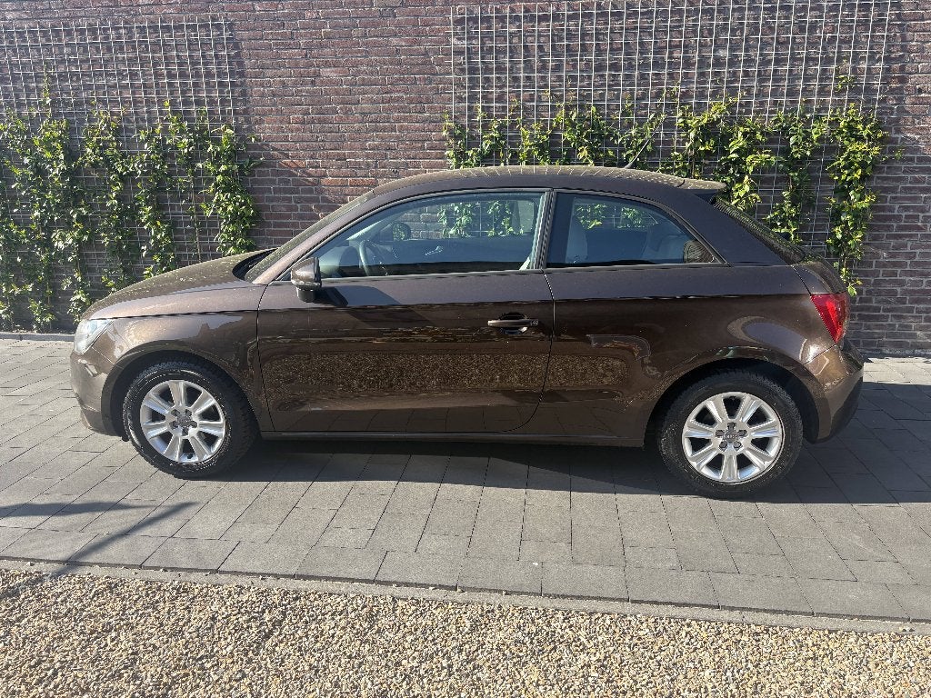 Audi A1 1.2 Tfsi 63KW 2011 Bruin, Auto's, Audi, Voorwielaandrijving, Euro 5, Stof, Beige