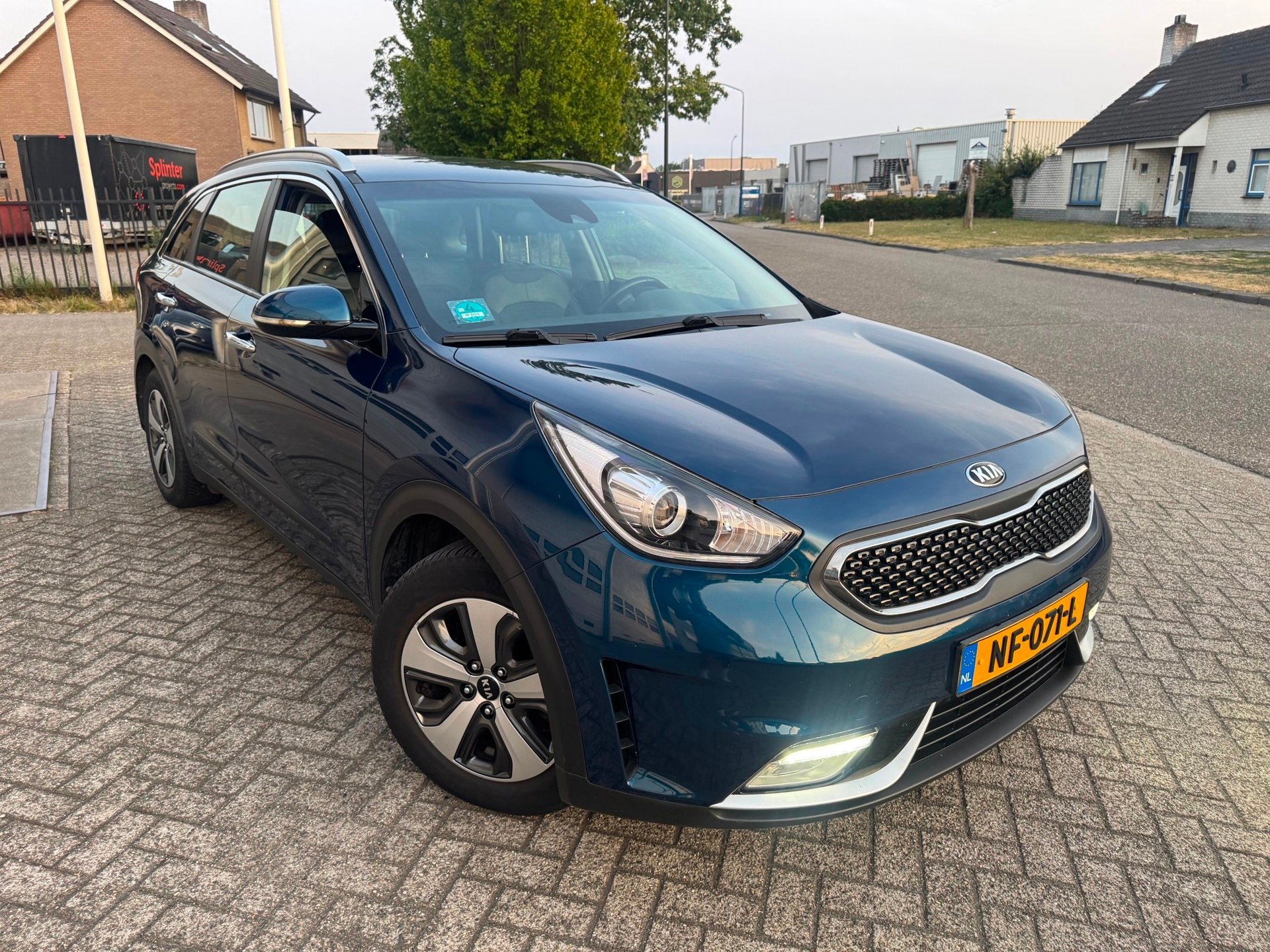 Kia Niro 1.6 GDi Hybrid First Edition Camera,Trekhaak, Auto's, Parkeersensor, Gebruikt, Euro 6, Blauw
