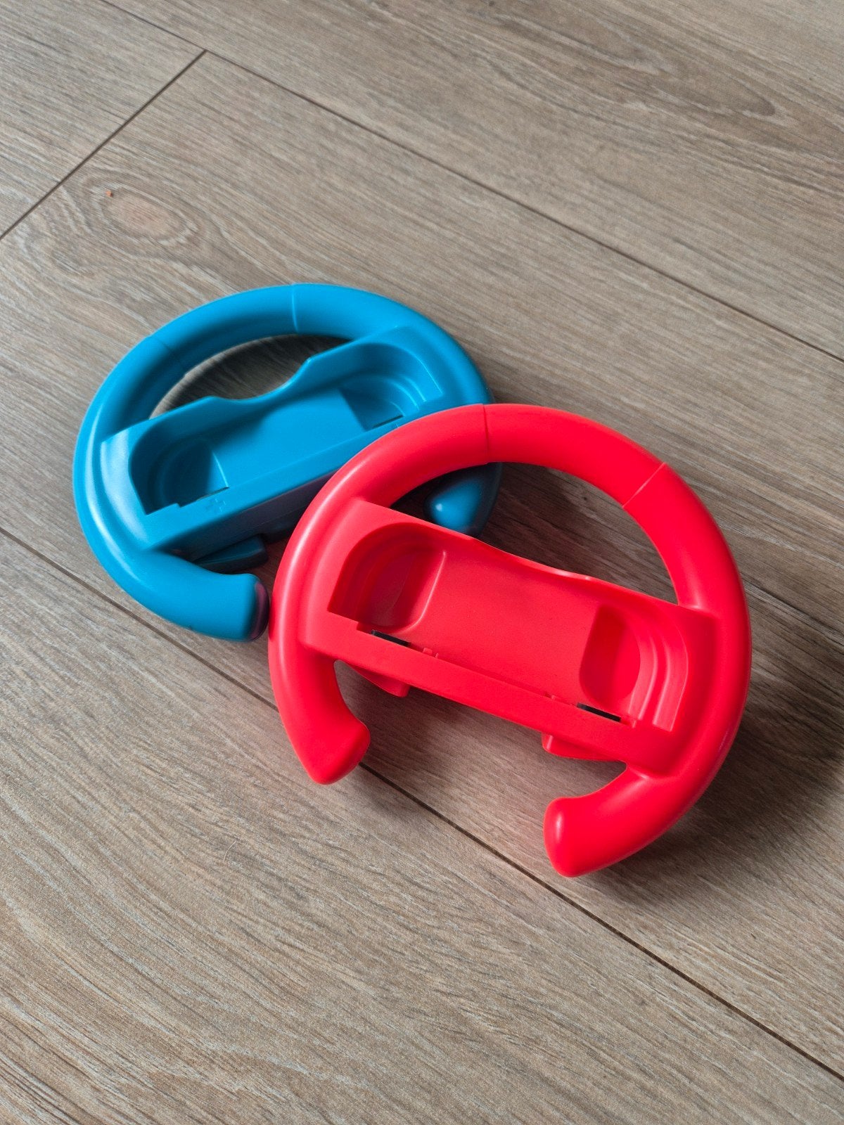 Nintendo Switch stuurwiel (rood en blauw), Ophalen of Verzenden, Zo goed als nieuw, Switch, Stuurtje of Sportattribuut