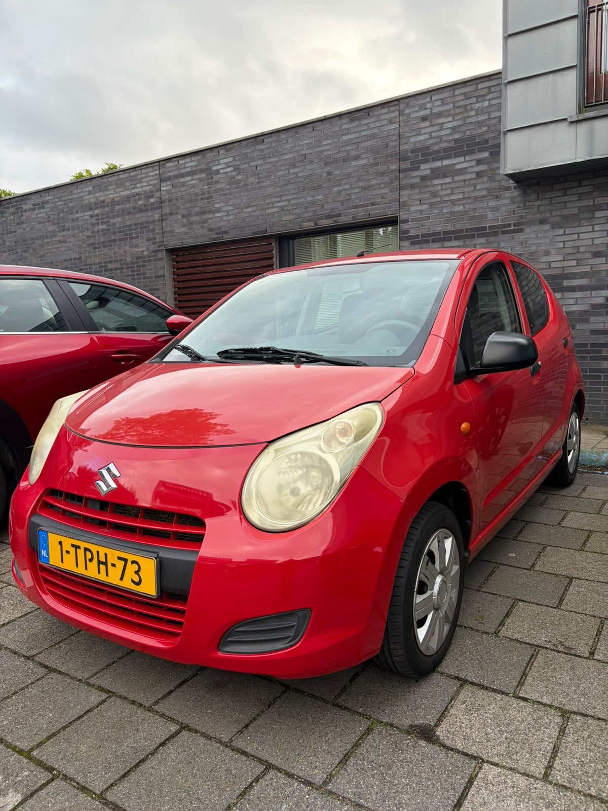Suzuki Alto 1.0 Aut. 2011 Rood, Auto's, 4 stoelen, 19 km/l, 3 cilinders, Geïmporteerd