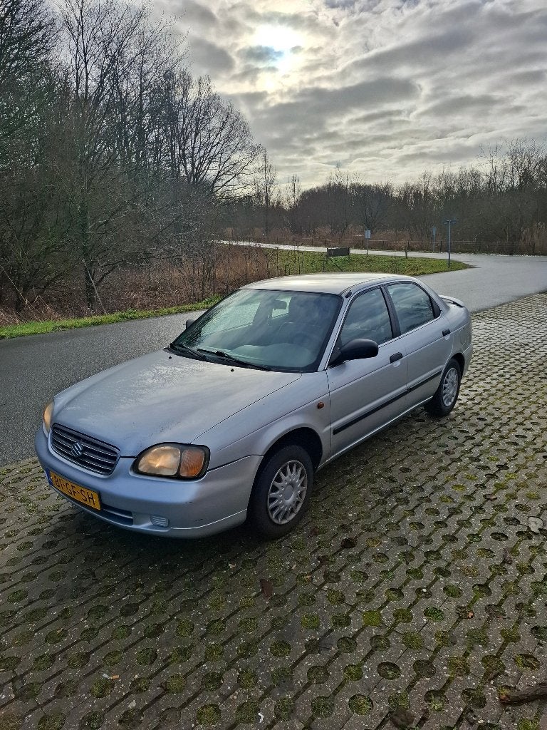 Loop/sloop Suzuki Baleno 1.3 Sedan 2000 Grijs, Voorwielaandrijving, 31 €/maand, 4 cilinders, 905 kg