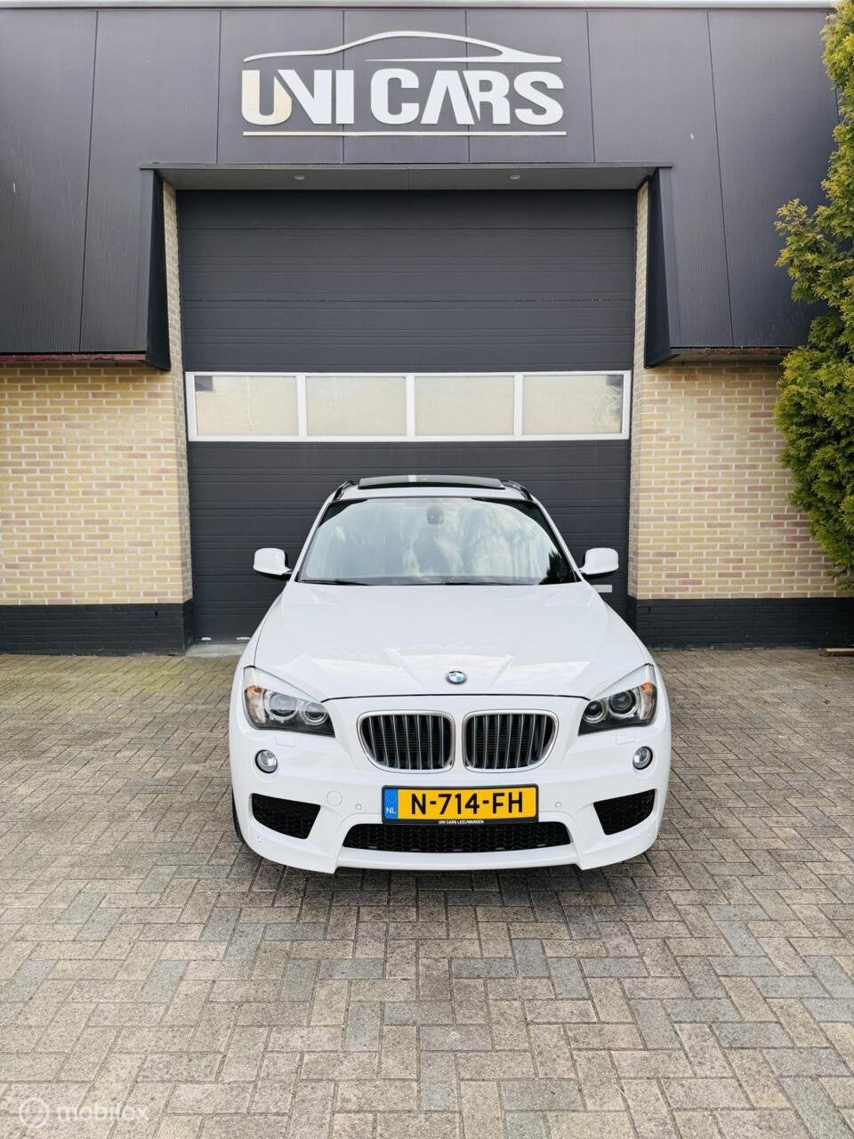 BMW X1 xDrive28i 245PK High Executive|M Sport||Alcantara|Dak, Auto's, Euro 5, Gebruikt, 4 cilinders, 2000 kg