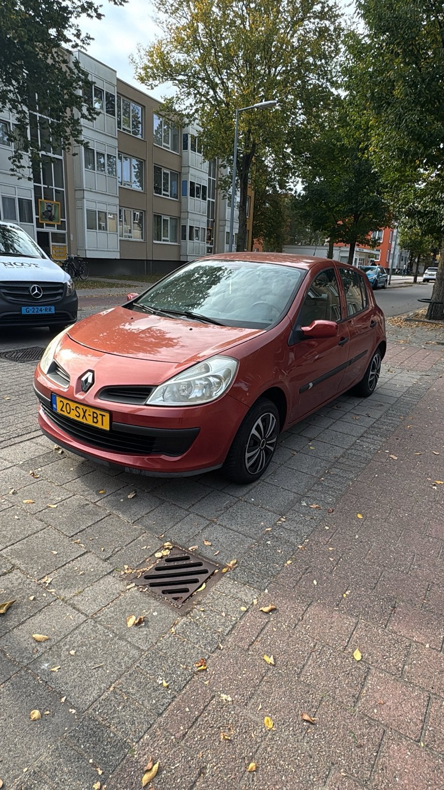 Renault Clio 1.2 16V 55KW 5-DRS E4 2006 Rood, Auto's, Voorwielaandrijving, 535 kg, 74 pk, 4 cilinders