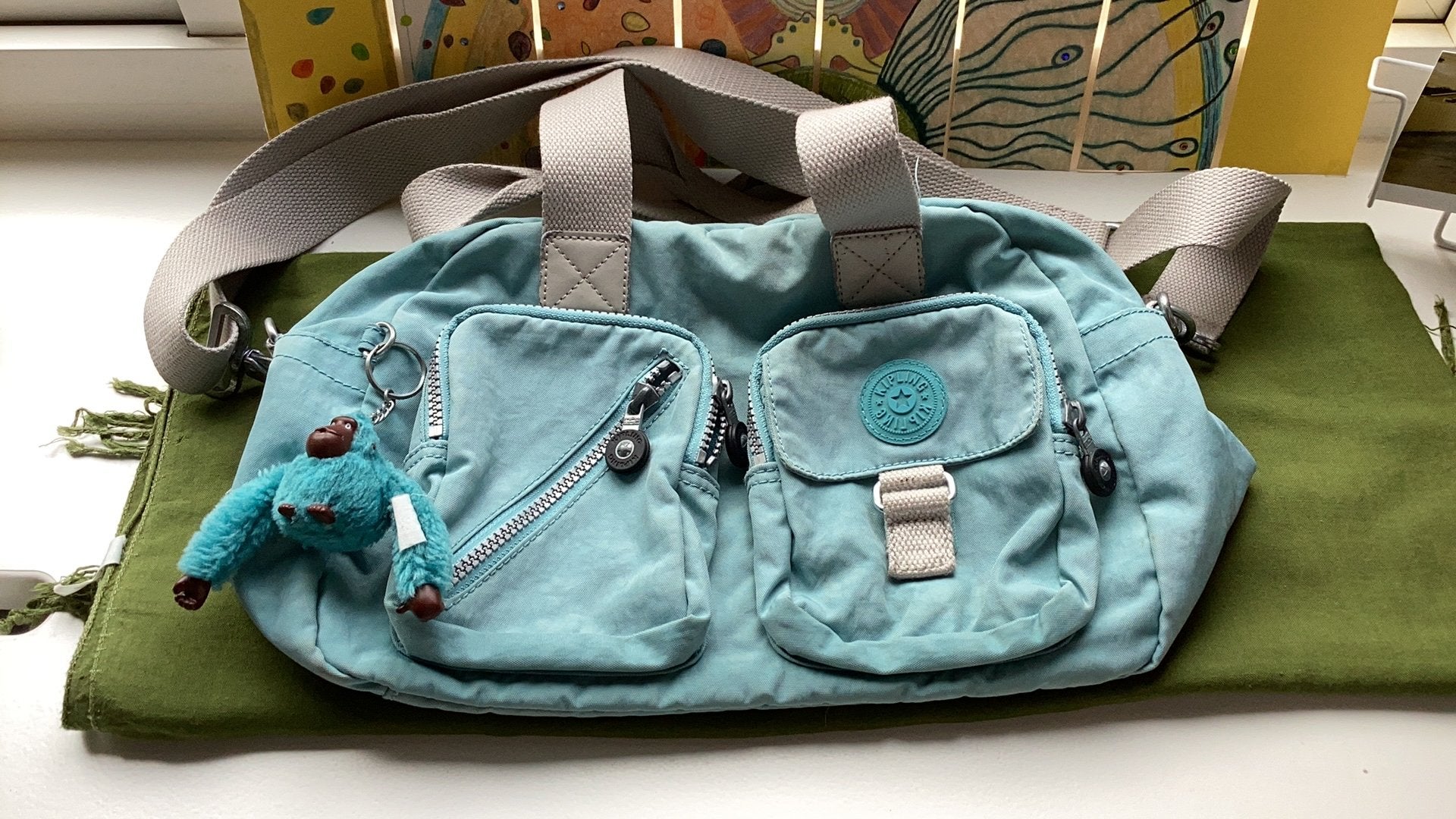Kipling. Lichtblauwe schouder- crossover tas., Sieraden, Tassen en Uiterlijk, Ophalen of Verzenden, Gebruikt, Blauw, Kipling