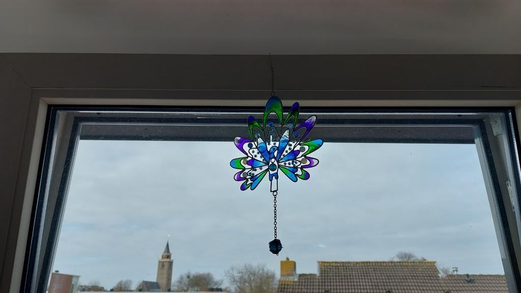 Glas in lood pauw, Ophalen
