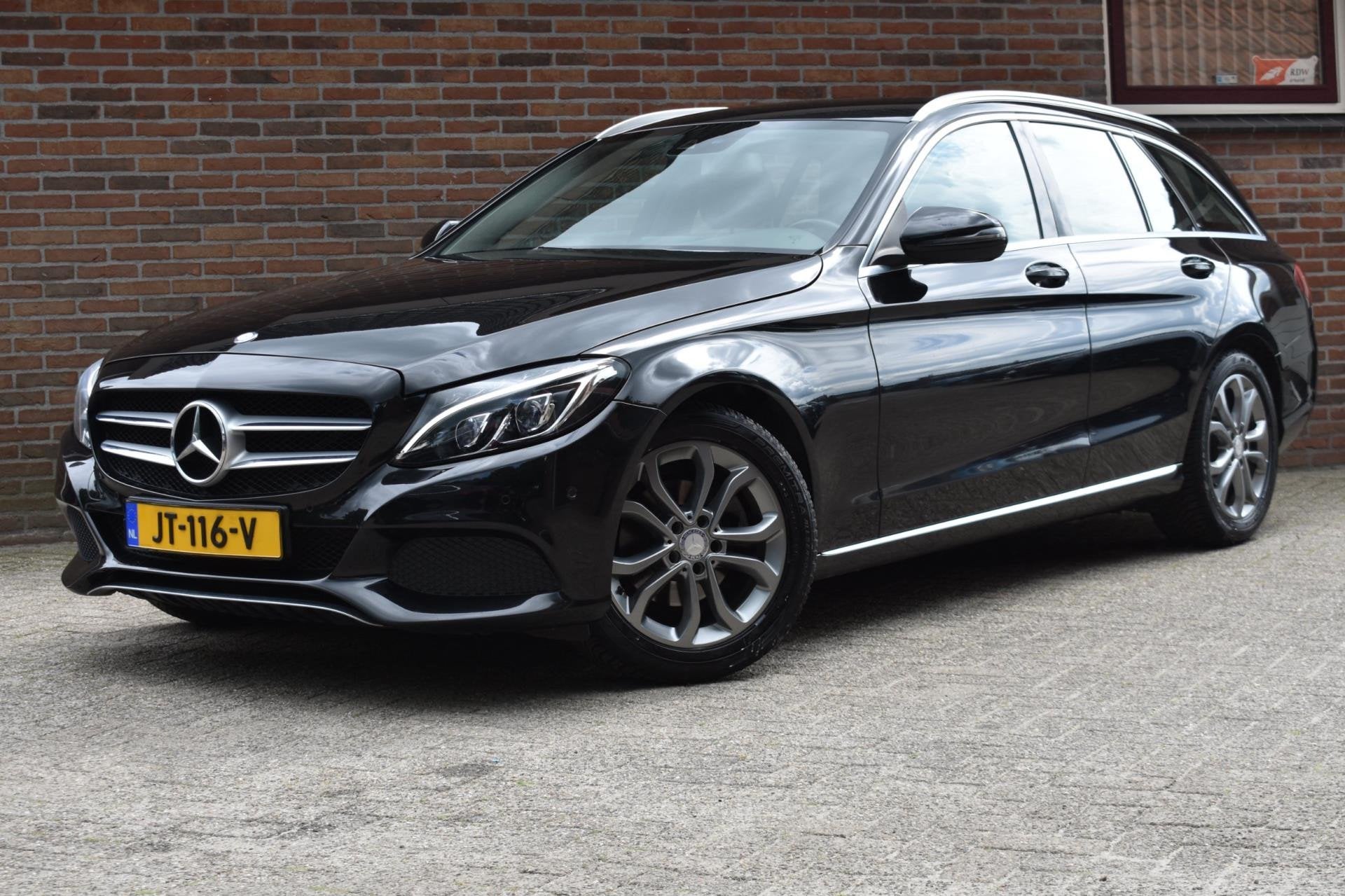 Mercedes-Benz C-klasse Estate 180 Lease Edition '16 LED Clim, Achterwielaandrijving, Gebruikt, Leder en Stof, Zwart