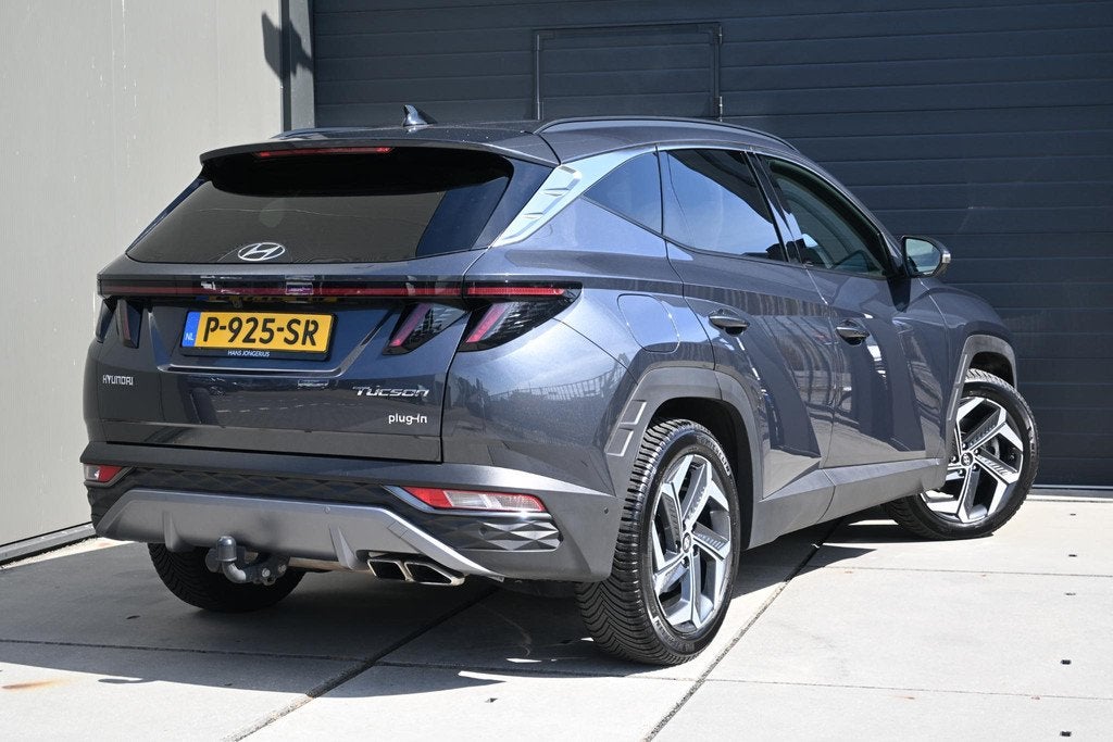 Hyundai Tucson 1.6 T-GDI PHEV Premium 4WD | TREKHAAK | STUUR, Auto's, Hyundai, Automaat, 1350 kg, 14 kWh, Gebruikt