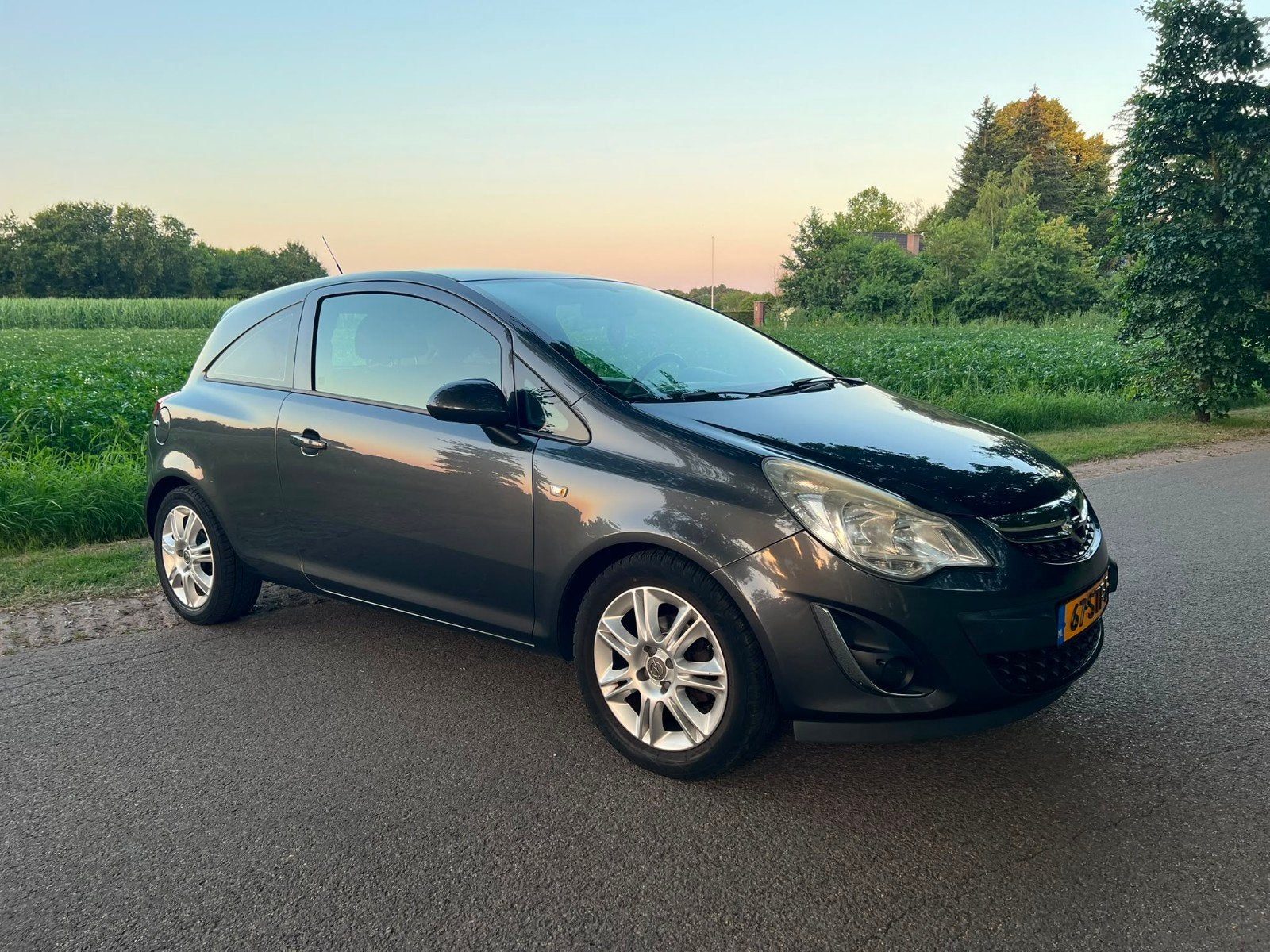 Opel Corsa 1.2 16V 3D 2011 Grijs, Auto's, Voorwielaandrijving, 450 kg, 40 €/maand, 4 cilinders