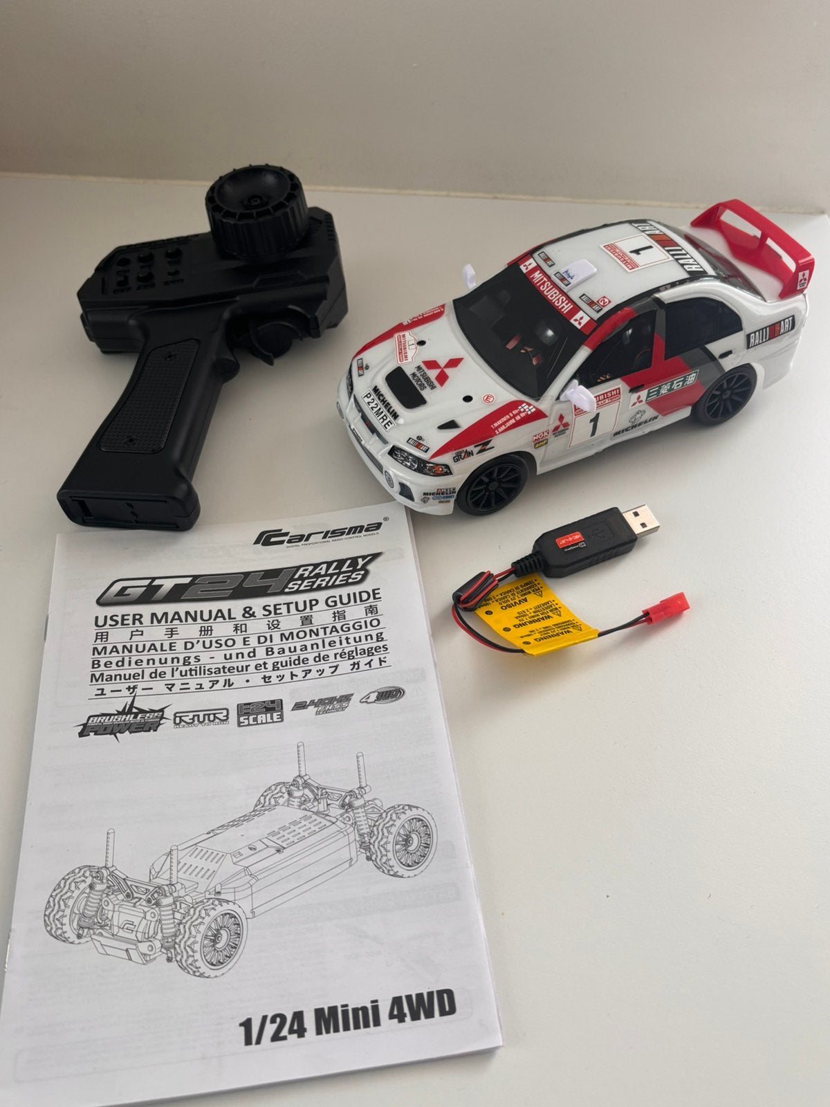 RC Drift/Rally auto 1/24 Carisma GT24 Mitsubishi als nieuw, Ophalen of Verzenden, Zo goed als nieuw, Overige schalen, Auto offroad
