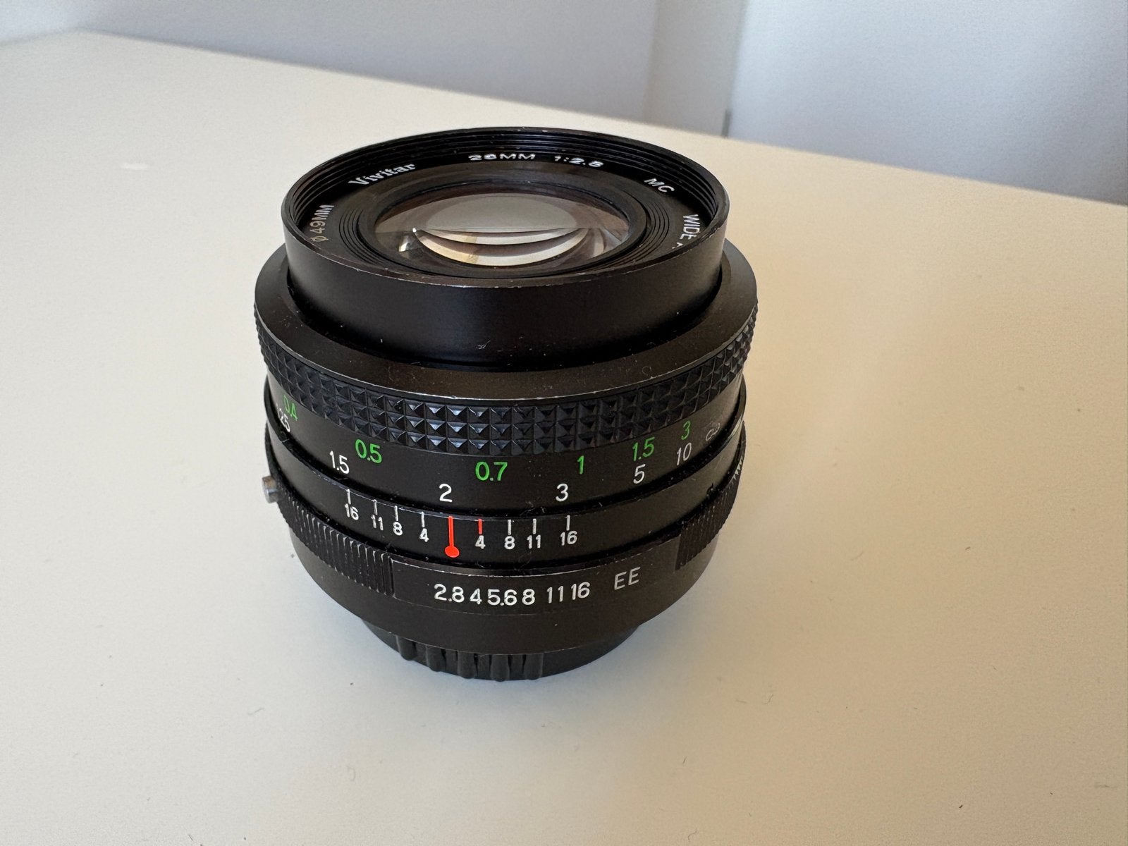 Vivitar 28mm f2.8 MC lens met accessoires, Ophalen of Verzenden, Gebruikt, Groothoeklens