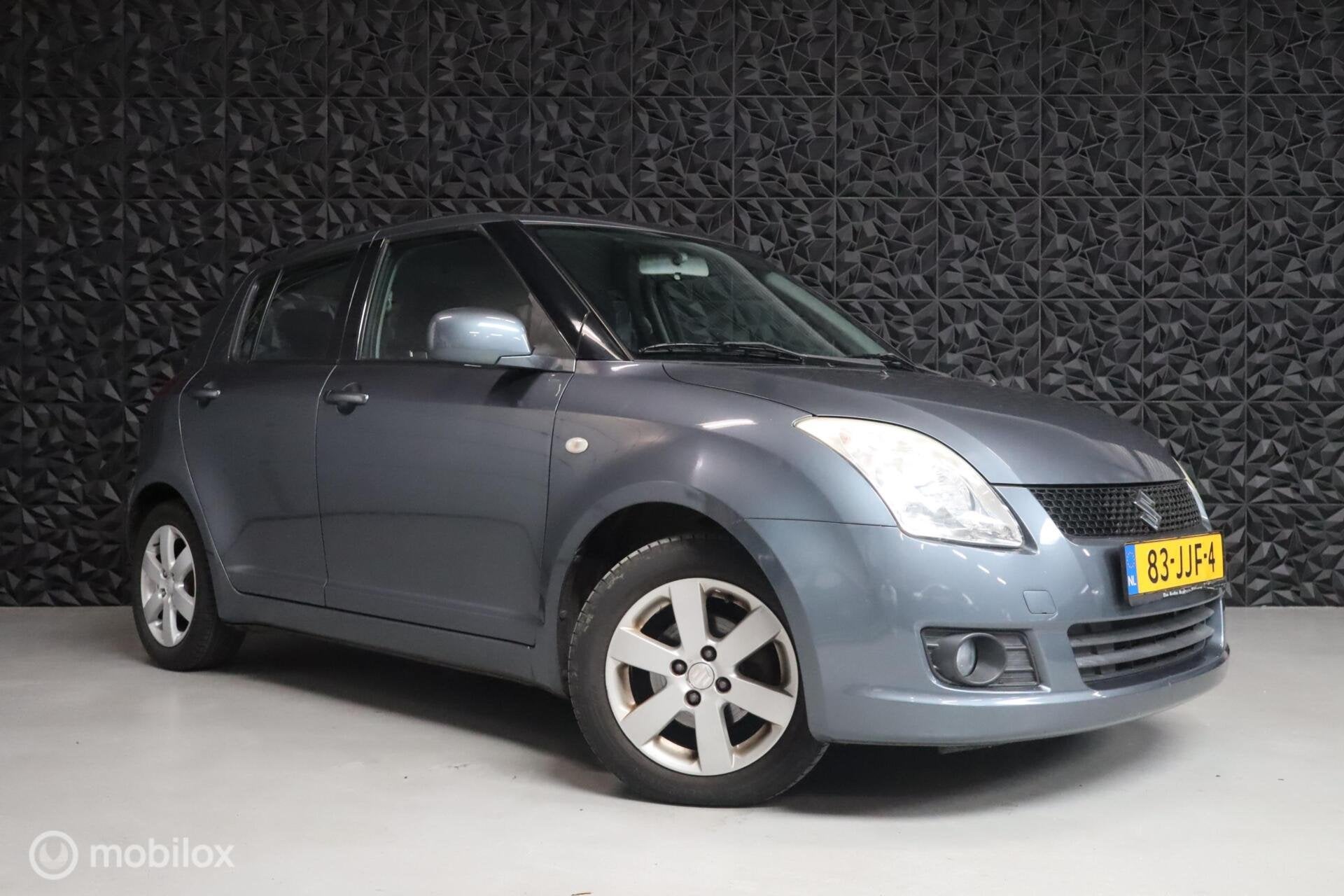 Suzuki Swift 1.3 Shogun | 5DR | Elektrische ramen | Airco |, Auto's, Voorwielaandrijving, 400 kg, Swift, Origineel Nederlands