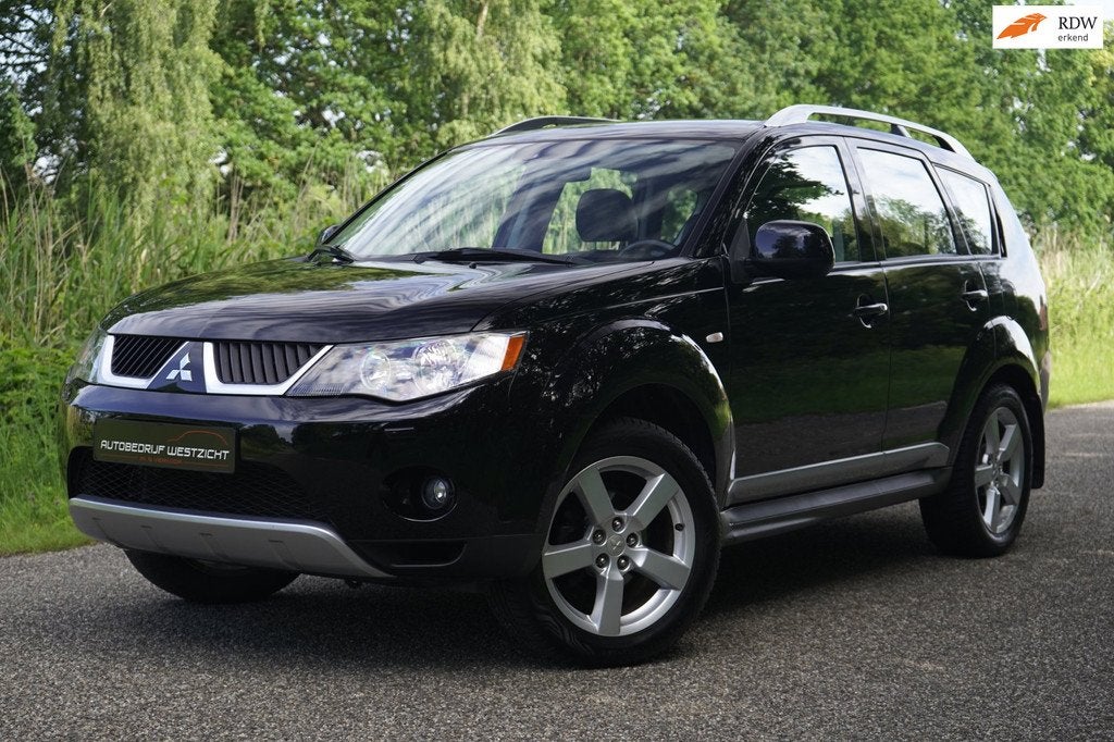 Mitsubishi Outlander 2.4 Instyle 4WD Automaat Leder Trekhaak, Auto's, Mitsubishi, Automaat, Zwart, 4 cilinders, Automatische klimaatregeling