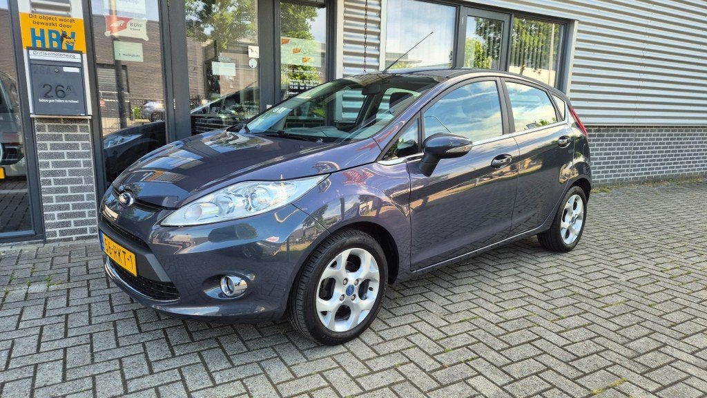Ford FIESTA 1.25 Titanium AIRCO PDC EL RAMEN CENTR VERG AFST, Voorwielaandrijving, Euro 5, 4 cilinders, 60 pk