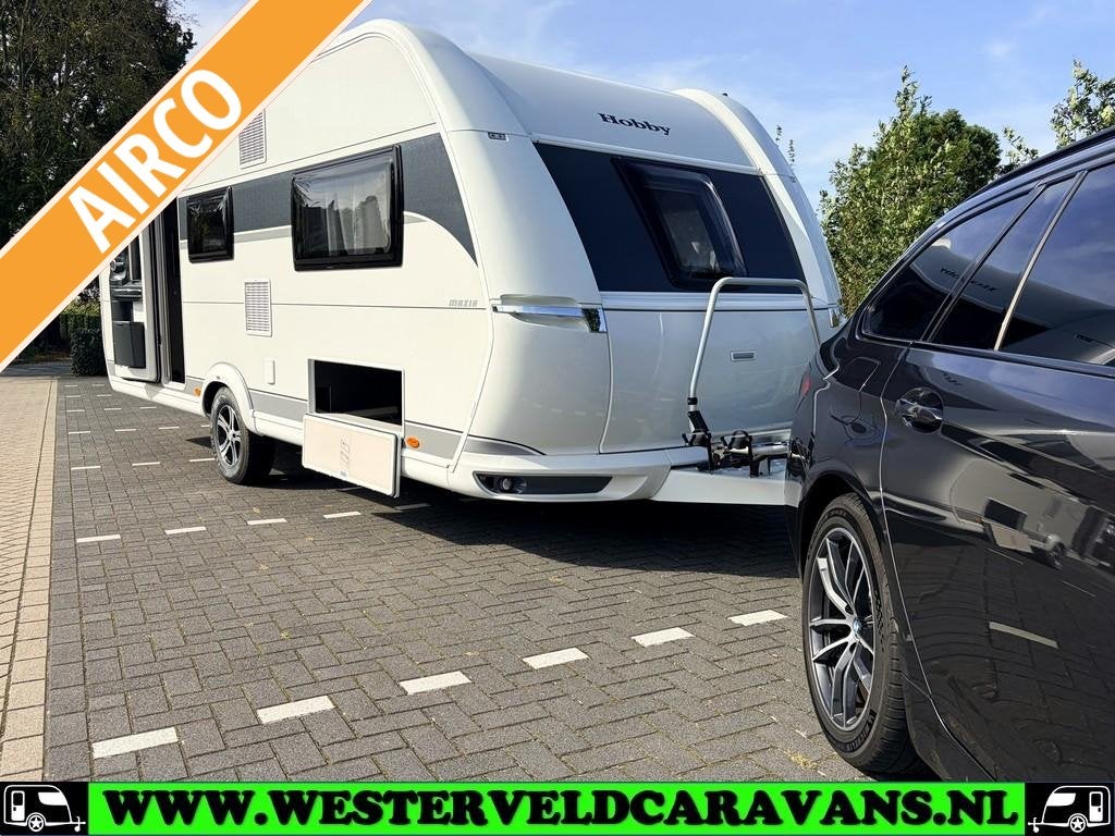 Hobby Maxia 585 UL +AIRCO +MOVER +THULE CASSETTELUIFEL ETC.!, Schokbreker, Rondzit, Hobby, Bedrijf