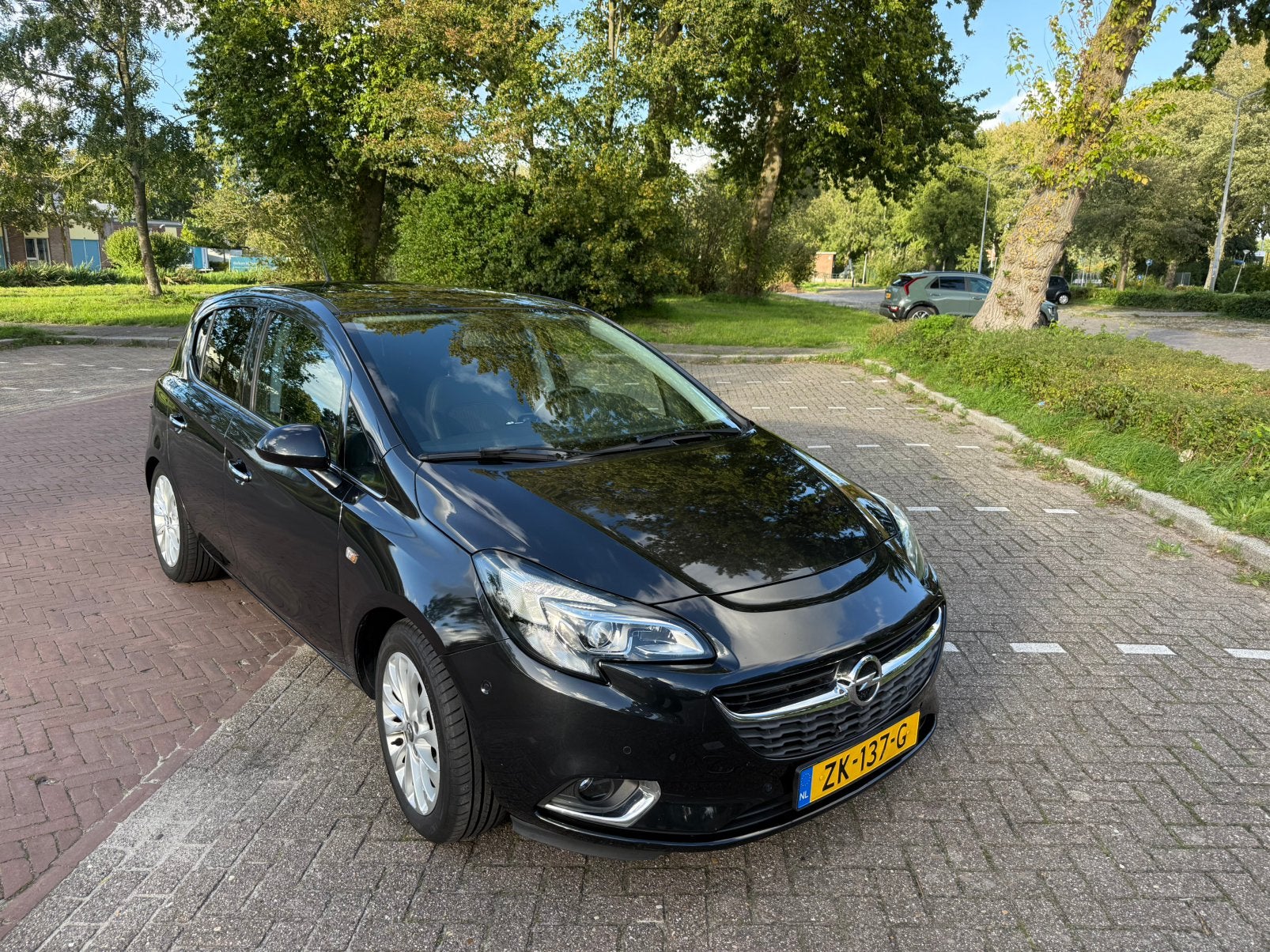 Opel Corsa 1.4 66KW/90PK 5D Easytronic 2015 Zwart, Auto's, 4 cilinders, Leder en Stof, 550 kg, Corsa