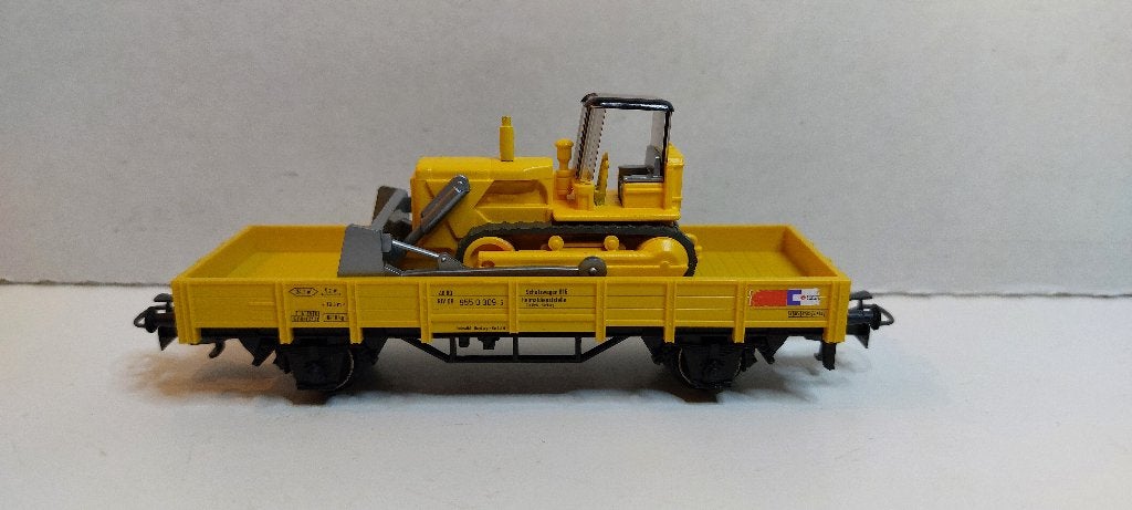 Strukton Lage Bakwagon met een Bulldozer *Nieuwstaat* (03), Wisselstroom, Wagon, Ophalen of Verzenden, Märklin