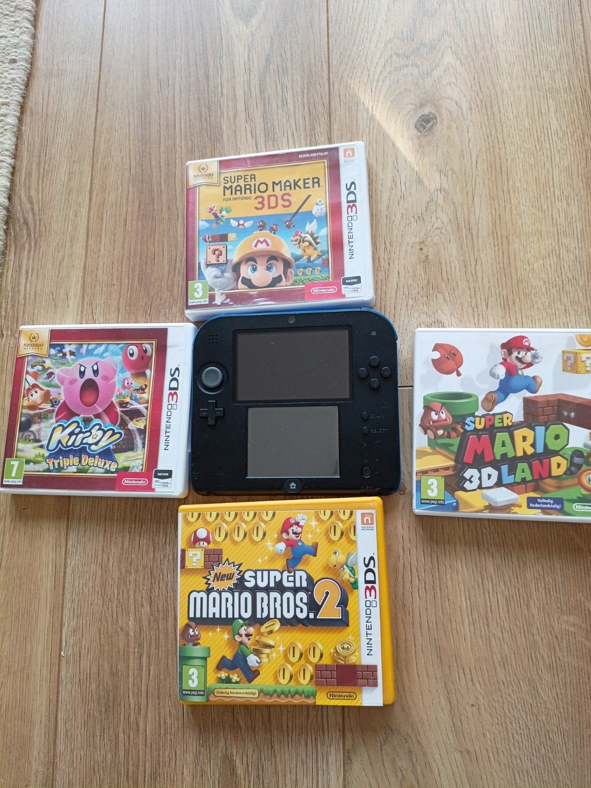 Nintendo 2DS met Super Mario Maker en 3 andere games, Spelcomputers en Games, Met games, Zwart, 2DS, Ophalen of Verzenden