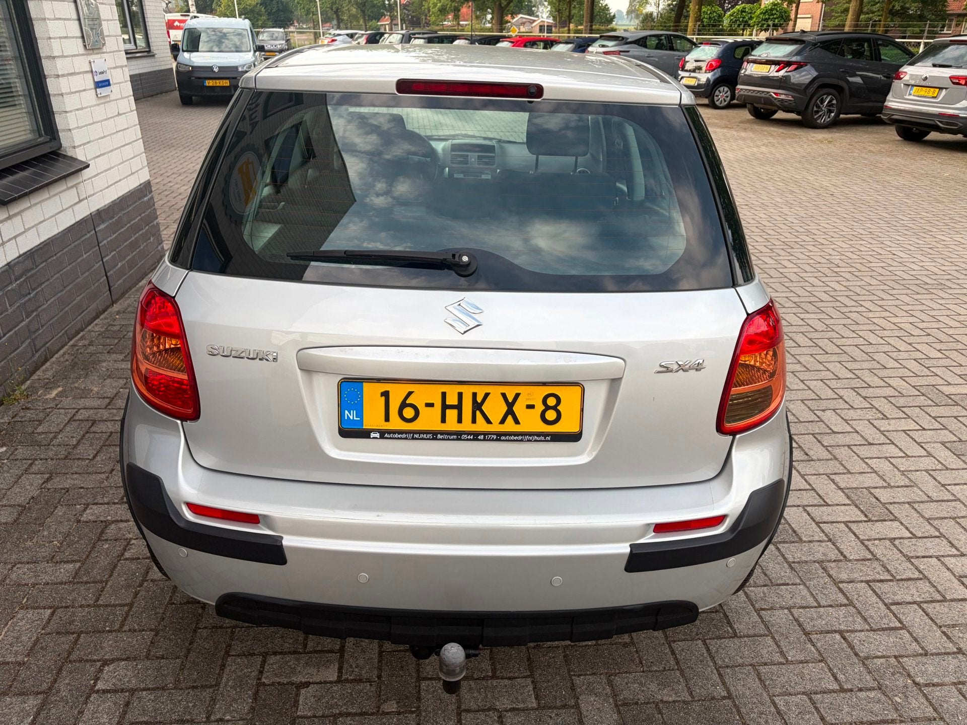 Suzuki SX4 1.6 Comfort / Centrale vergrendeling / Airco / Tr, Auto's, Voorwielaandrijving, Gebruikt, Zwart, 4 cilinders